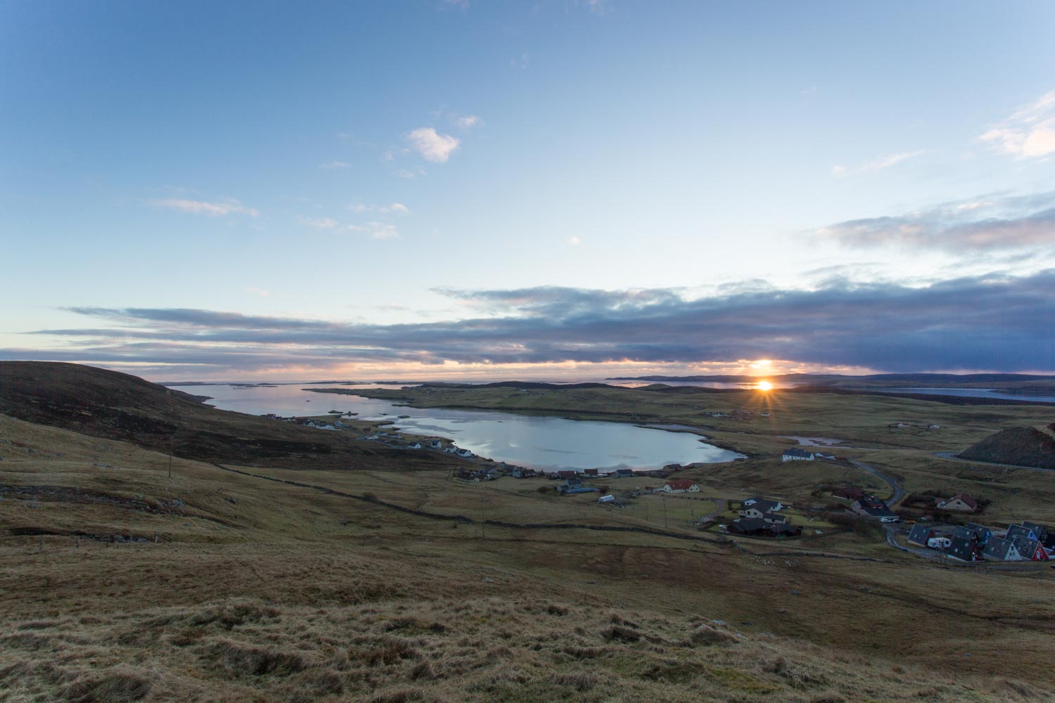 Sunset from the top of Wormadale looking out Whiteness Voe.