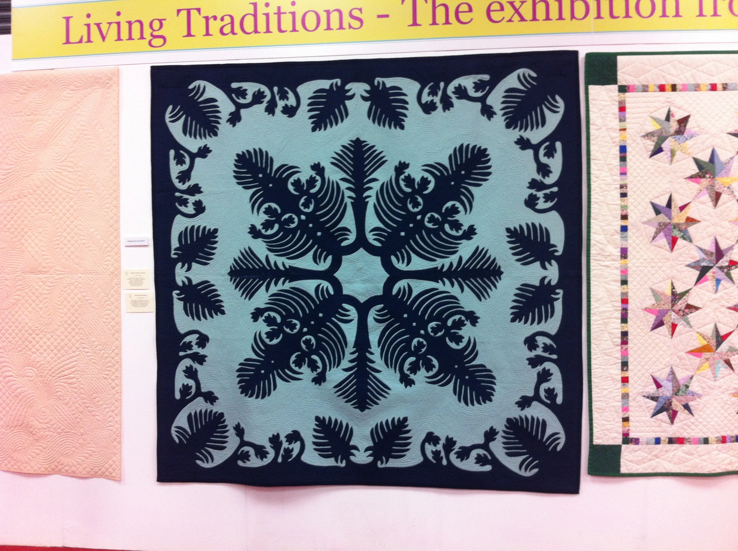 A quilt done in the traditional Hawaiian style.
