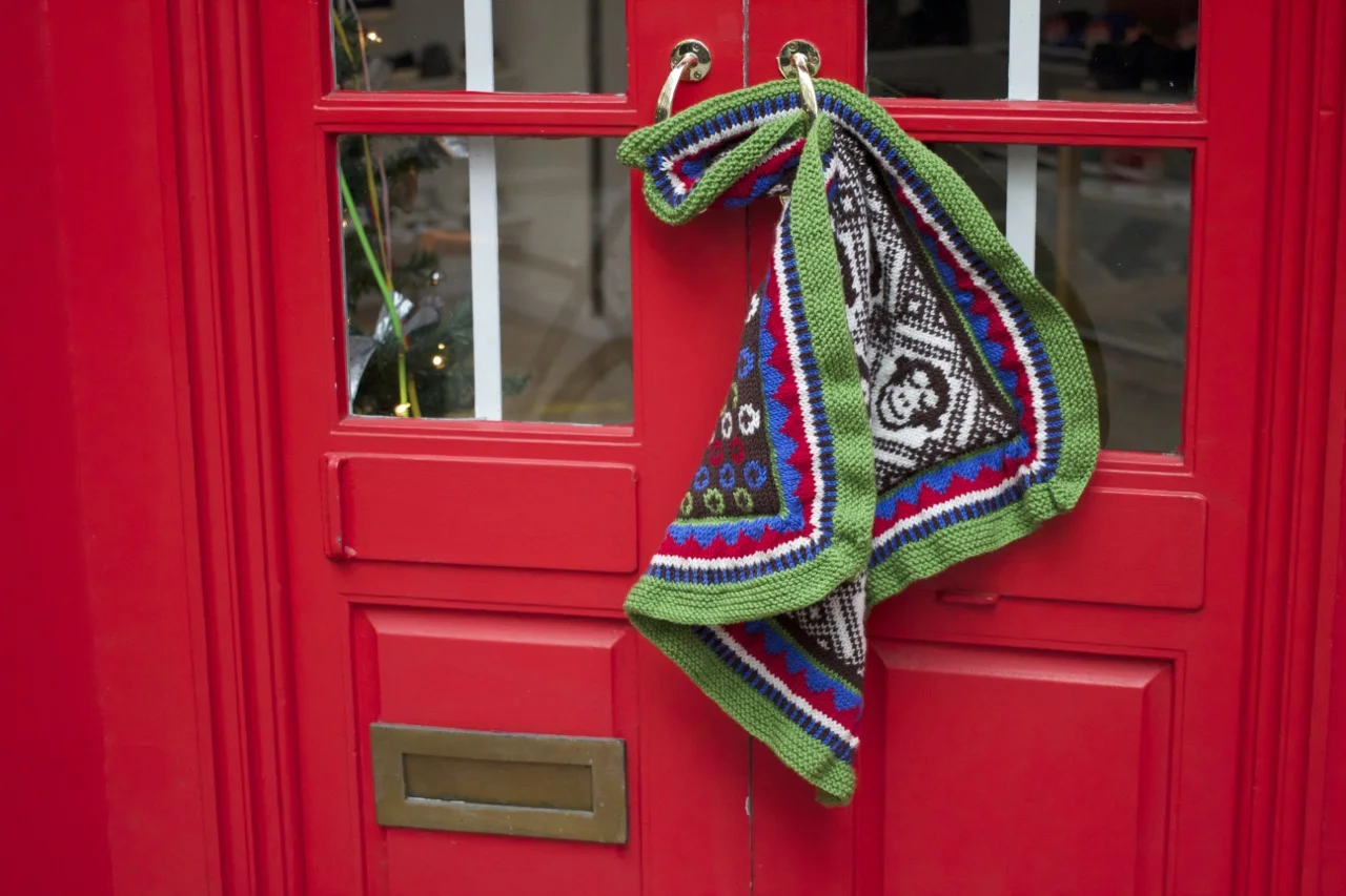 Couldn't resist using this festive red door as a backdrop for the blankie!