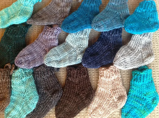 These are some of the mini socks that Catherine knit. Aren't they adorable? Such a perfect way to see the richness of the hand-dyed yarn. Photo courtesy of Catherine Hopkins.