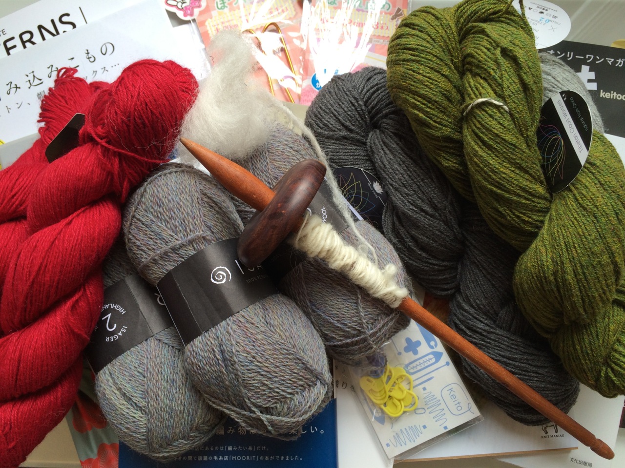 I know it looks like mostly yarn, but the books were heavily in favour as stash enhancement on this trip, they're just buried underneath!
