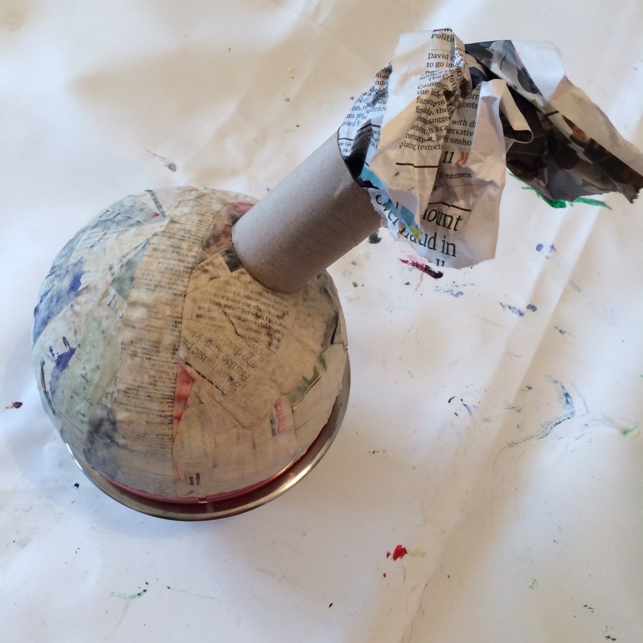 Adding the neck and head. The neck was glued using regular white school glue and allowed to dry completely.