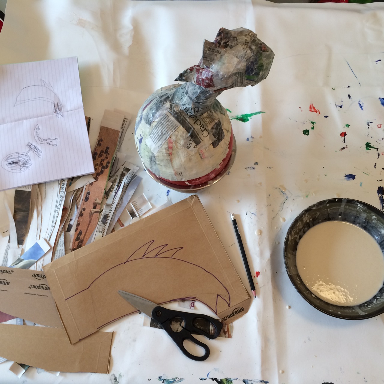 The wings (with claws and more spikes) were cut out of cardboard from the recycling bin. Mr. H drew a picture of the wings he wanted.