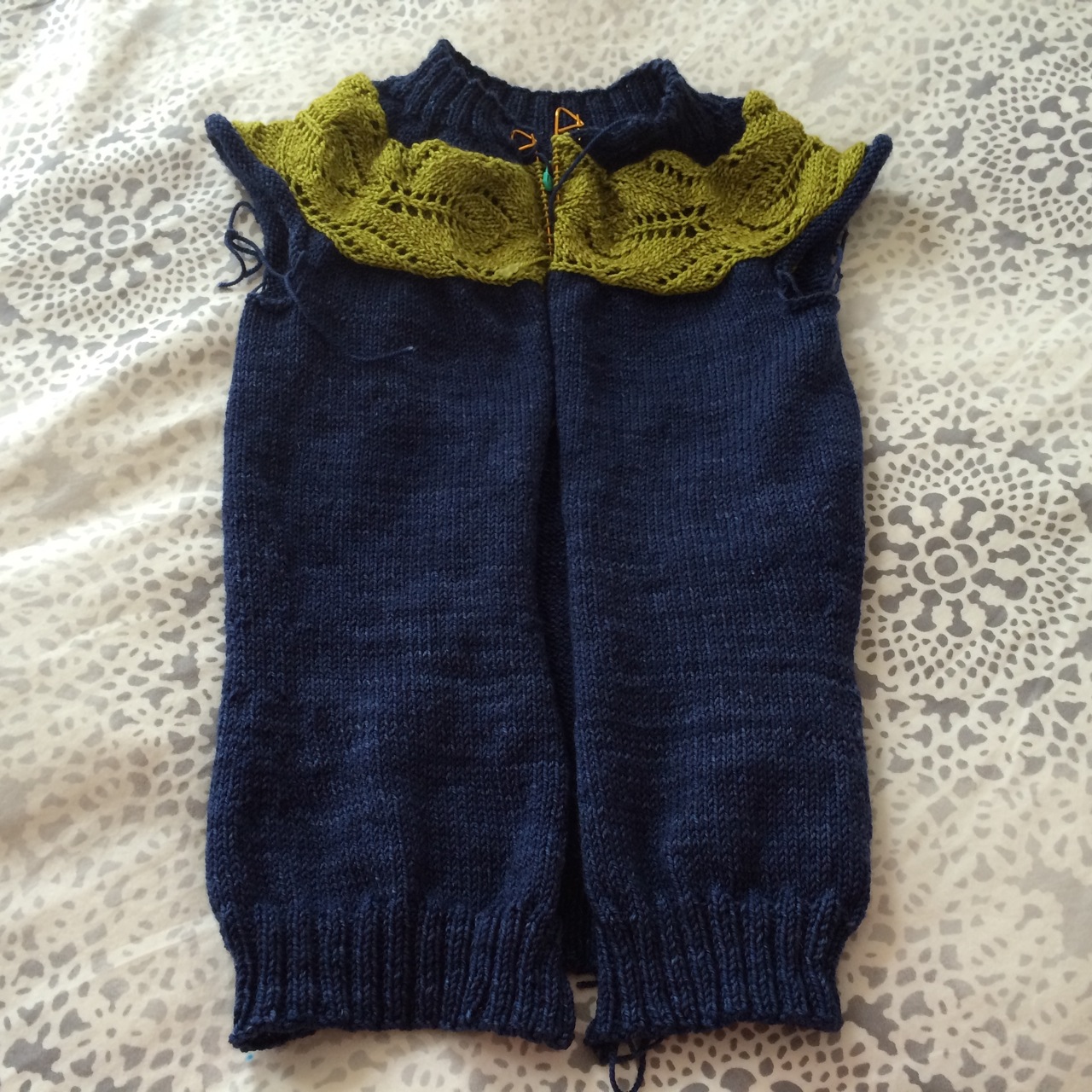 Just the sleeves and the button band to go!