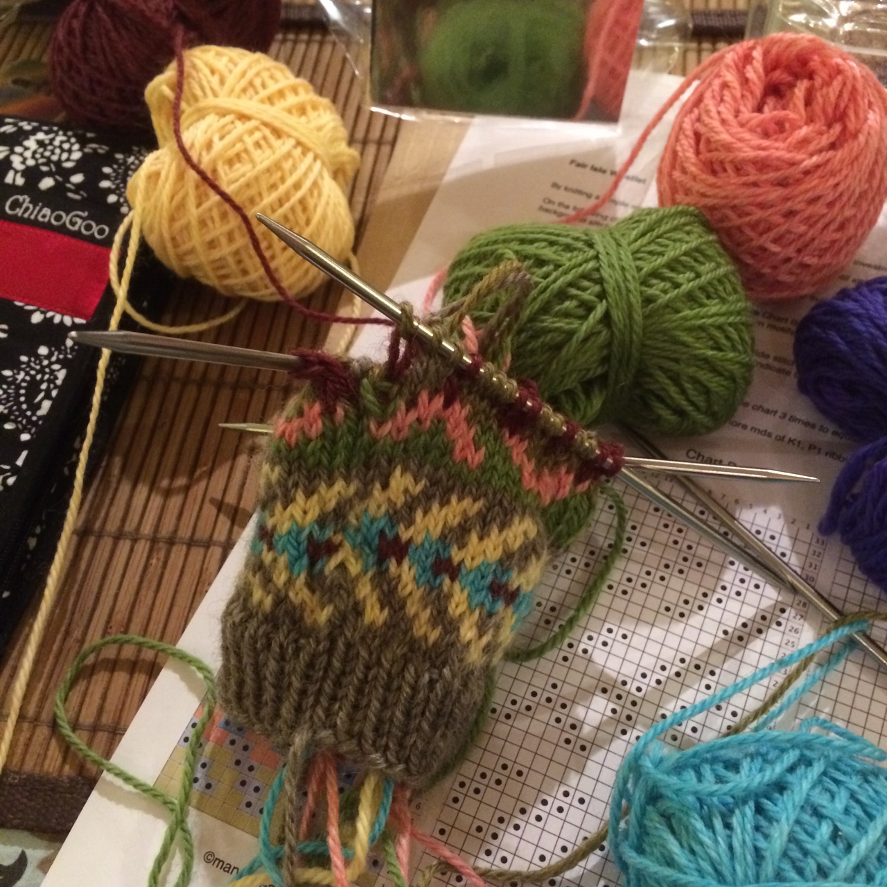 My fair isle cuff in progress. Somewhere along the way I lost one of my DPNs - surely a sign of a good class!