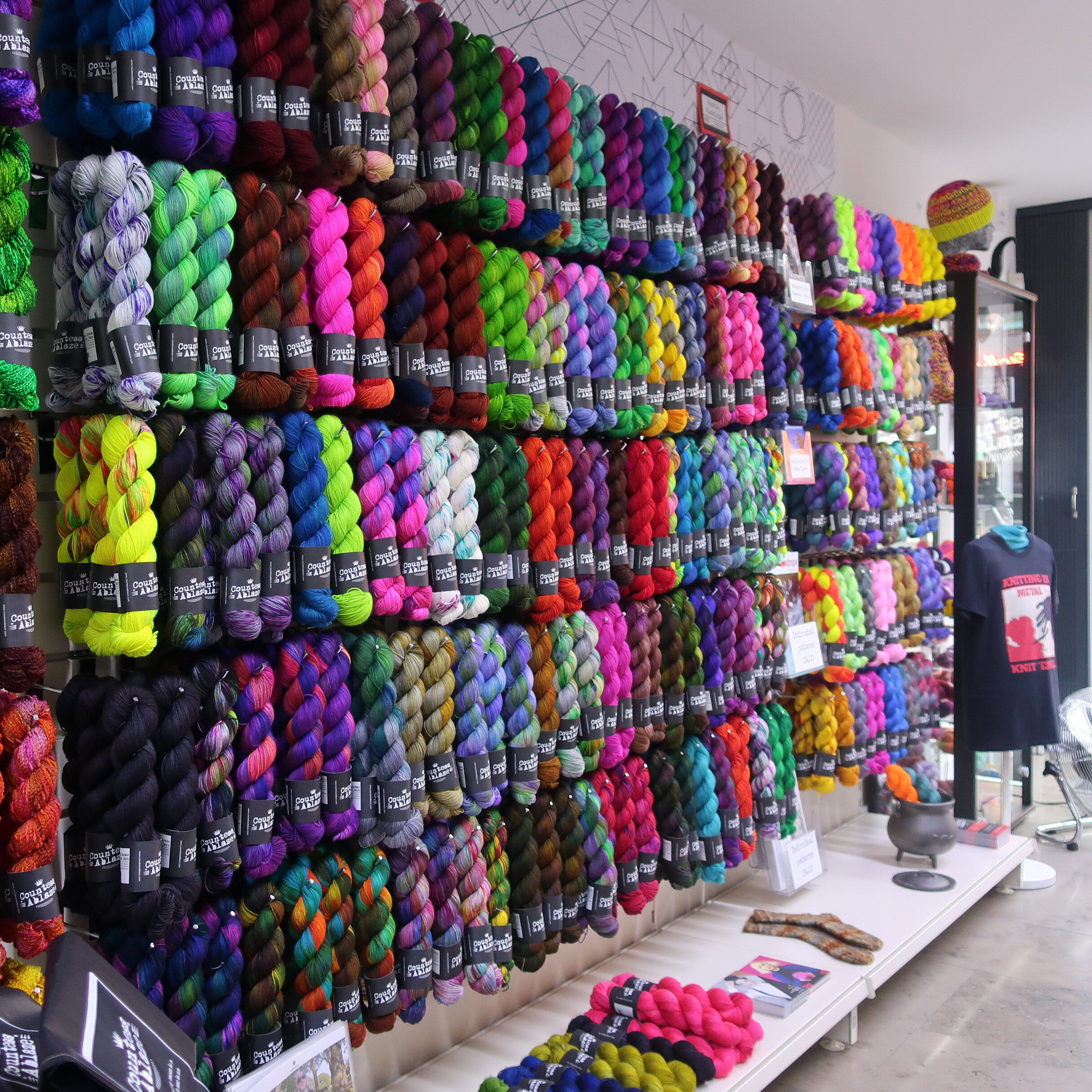 The great wall of 4ply on the fingering floor at Countess Ablaze’s shop in Manchester