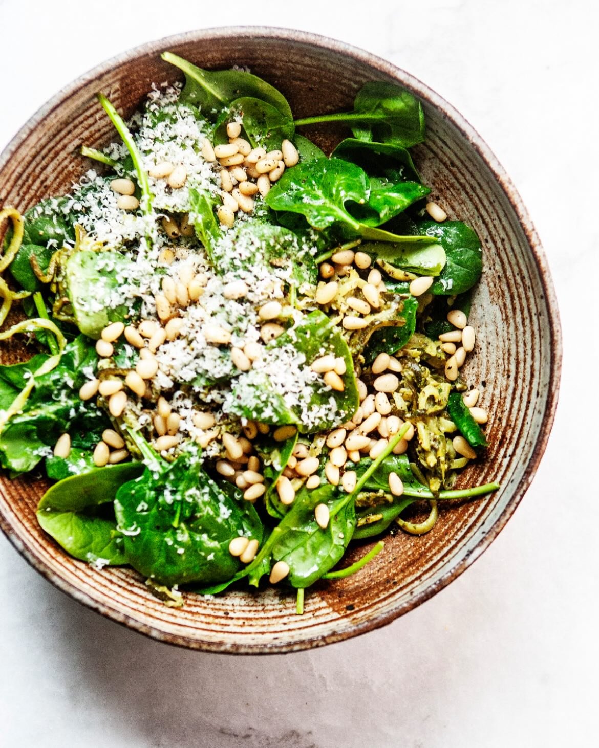 BEAUTIFUL FOOD BY DESIGN | Noodling around the kitchen studio with Zucchini Noodles with Peso &amp; Spinach -recipe coming! 

TAP BIO FOR LINK
https://bijouxs.com/the-best-basil-pesto/
.
.
.
#zucchini #zoodles #basil #pesto #spinach #pinenuts #parmes