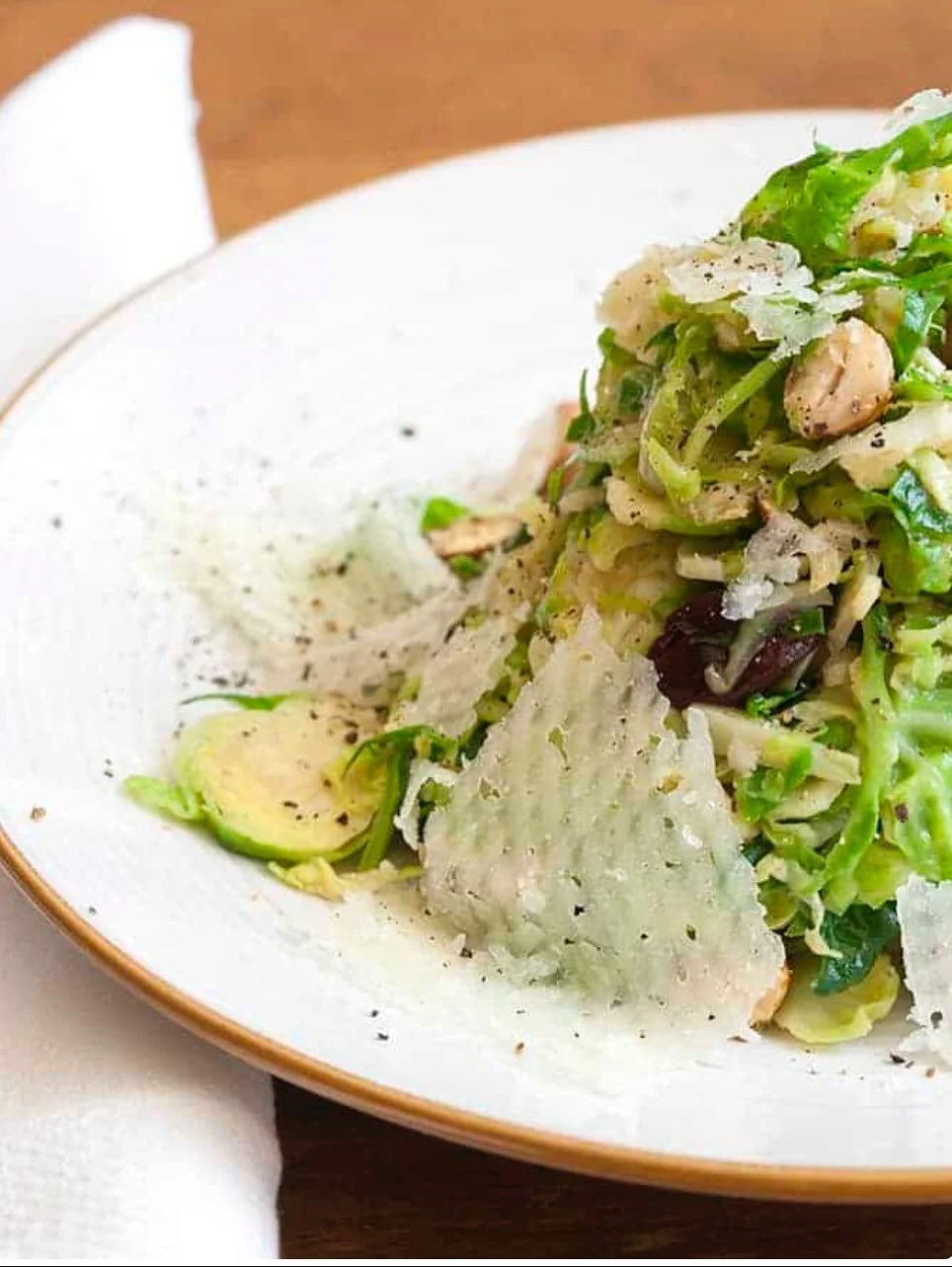 A favorite salad from La Grande Orange Cafe in Pasadena, sadly now shuttered, provided the inspiration to create a dish using Bijouxs favorite little fall jewels, 
Brussels sprouts, sour cherries, hazelnuts, 
Manchego cheese in a lovely lemon-miso dr