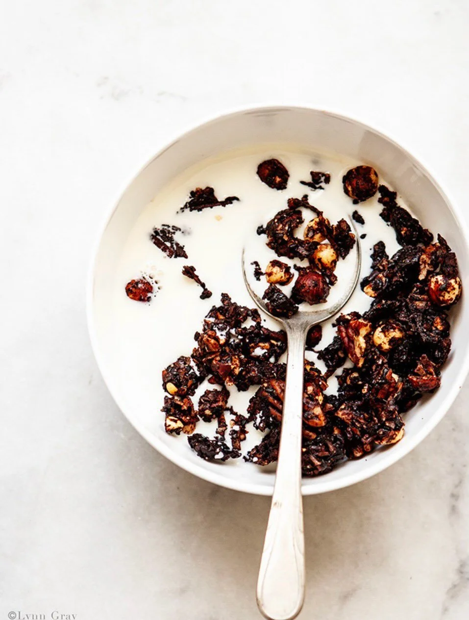 BEAUTIFUL FOOD BY DESIGN | Post yoga class bowl of Bittersweet Chocolate Granola oh, it&rsquo;s grain free. 
TAP BIO FOR RECIPE 
https://bijouxs.com/bittersweet-chocolate-granola/
.
.
#chocolate #bittersweet #granola #grainfree 
#bijouxslittlejewels