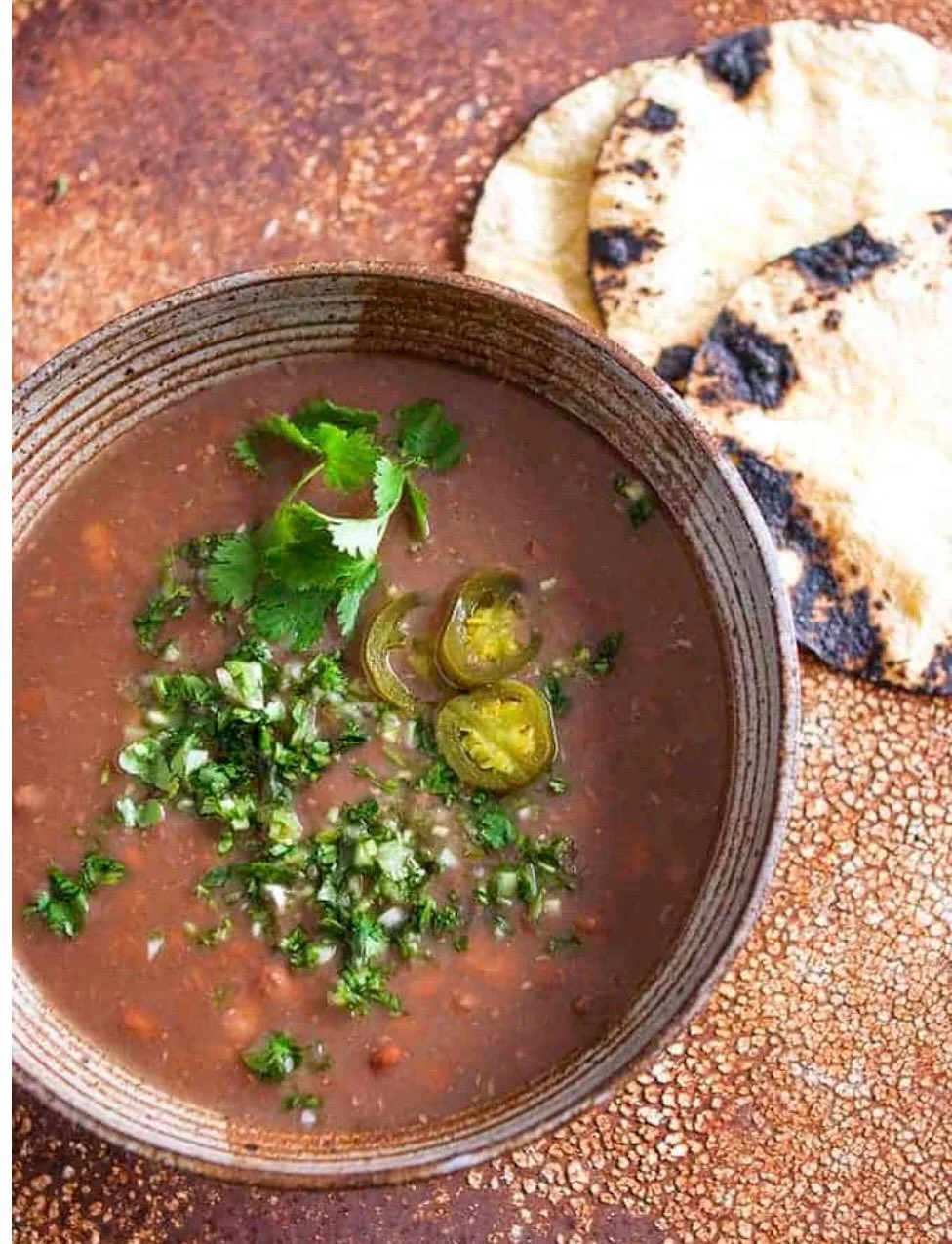 BEAUTIFUL FOOD BY DESIGN | No 208 Bijoux&rsquo;s Basics: Frijoles de la Olla (Beans in a Pot) 

Simply rich&ndash;Frijoles de la Olla. A pot of pinto beans simmered to perfect, creamy richness, then yielding to many a satisfying bowl, also serving as