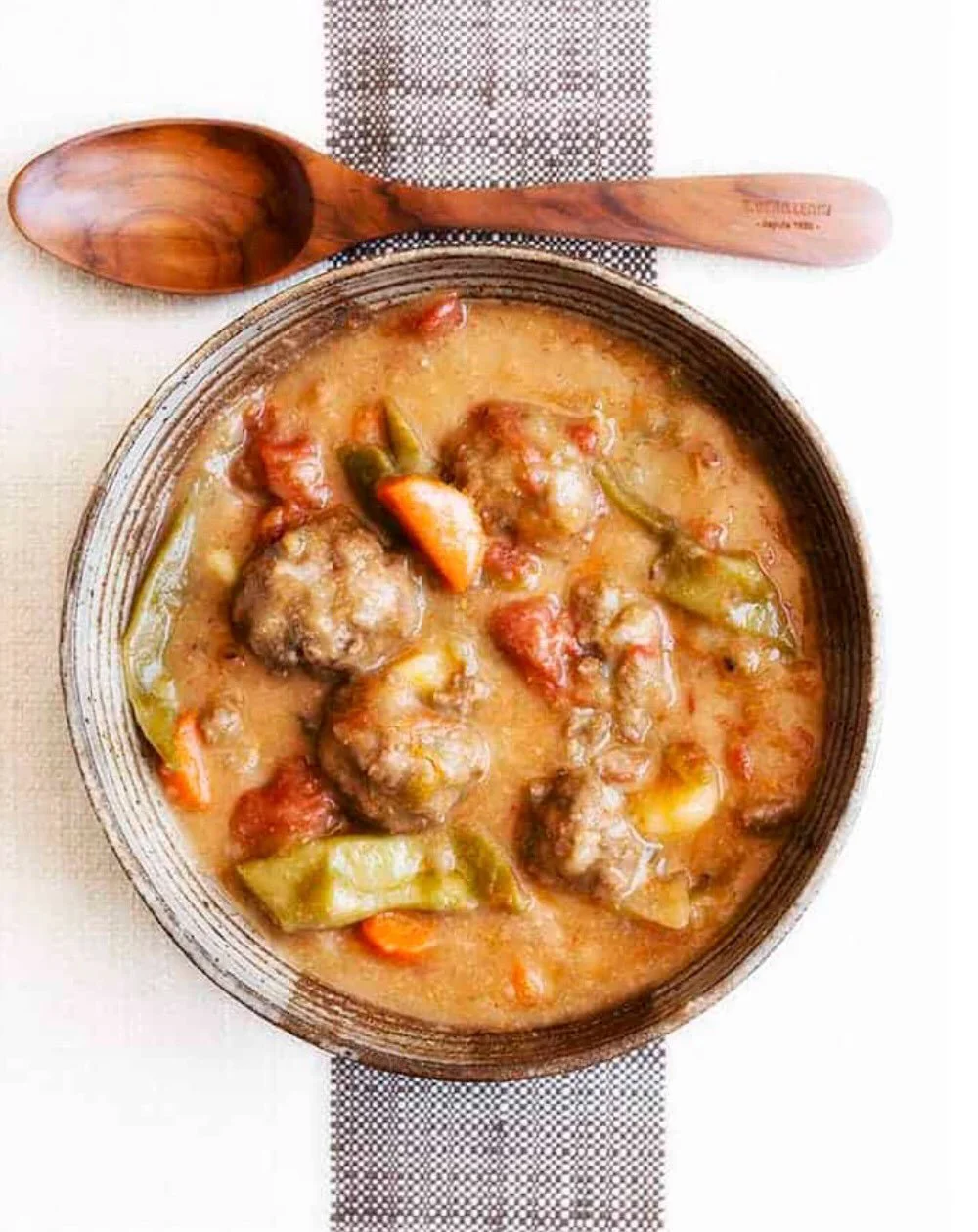 BEAUTIFUL FOOD BY DESIGN | Beef Fricasse is a childhood family favorite, better known to us kids as &ldquo;meatball stew&rdquo;. A French-inspired hybrid, this mild, yet flavorful stew, is loaded with tender meatballs and plenty of vegetables, includ
