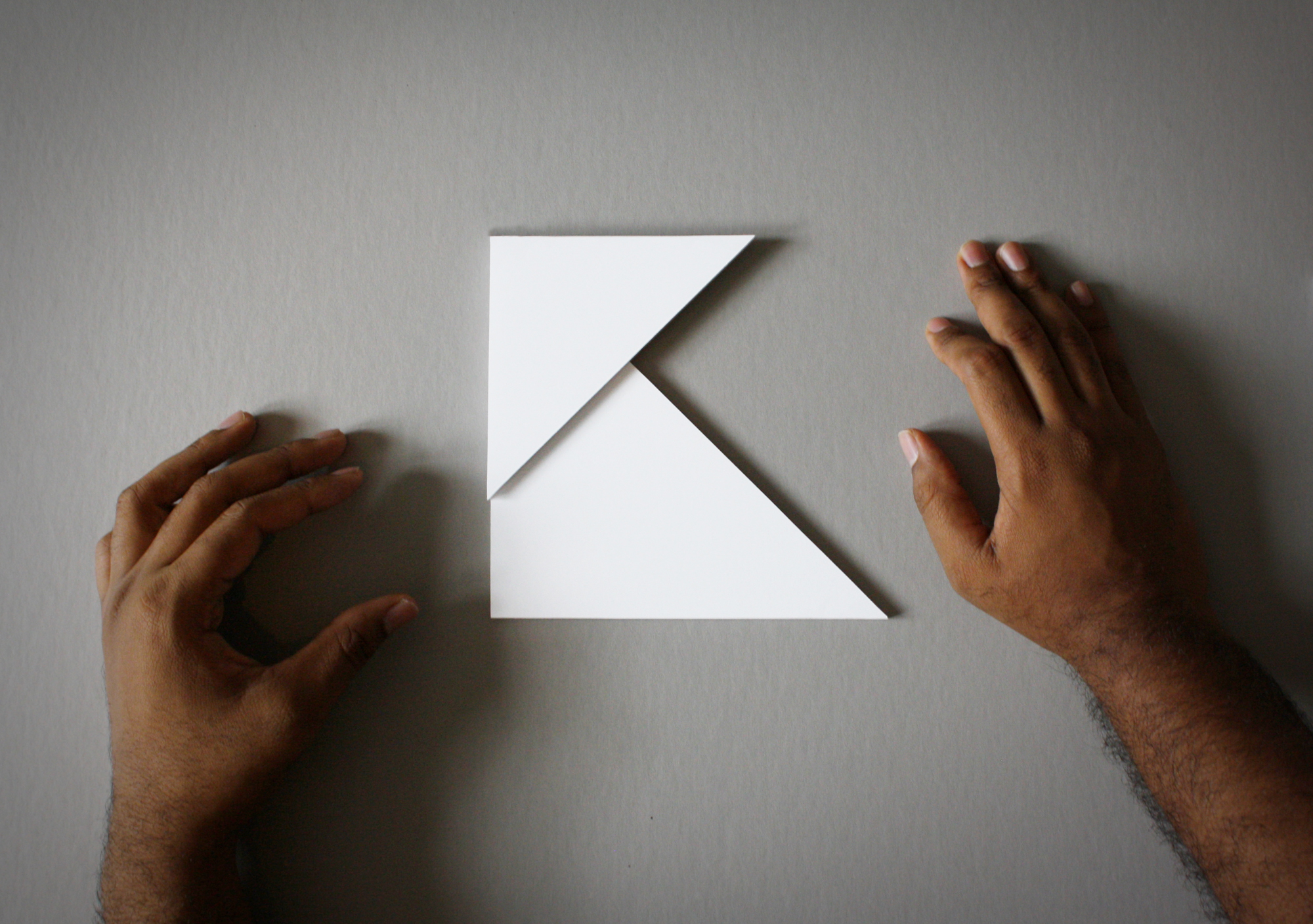 With the simple overlapping of geometric shapes letters can form. This here is the letter K .