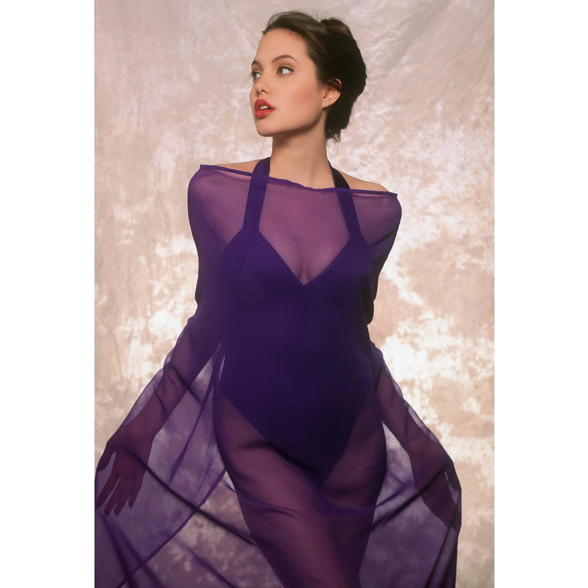 angelina jolie purple dress Jolie in a slime dress