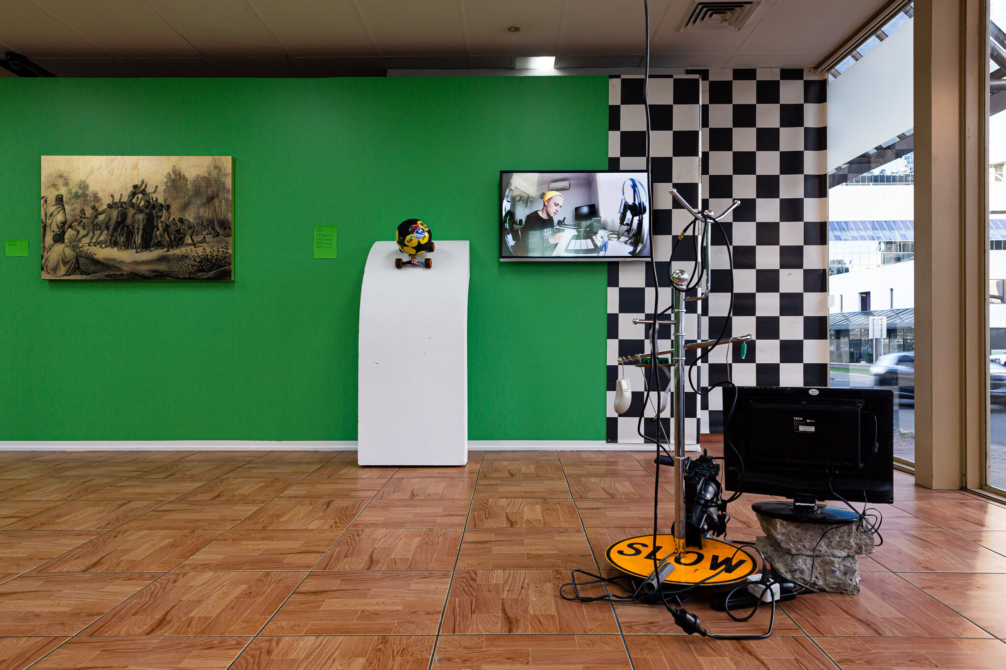   Sports Show,  2020, installation view, left to right: Brook Andrew,  Australia I Black Gold,  2012, Feras Shaheen,  Cross Cultures  series, 2020. 