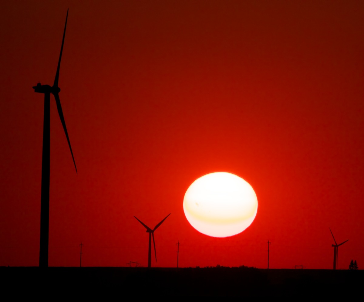 2012-07-09 at 18-38-49 windmill sunset red sun energy renewable prairie.jpg