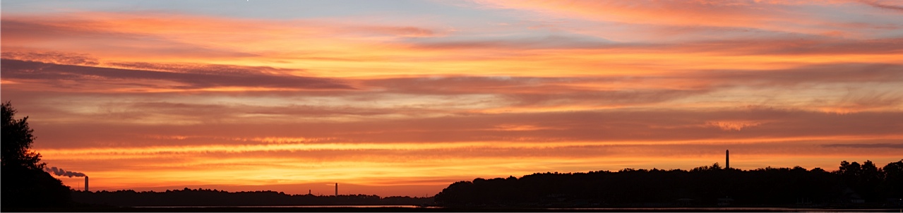 Golden sunlight paints the predawn sky.