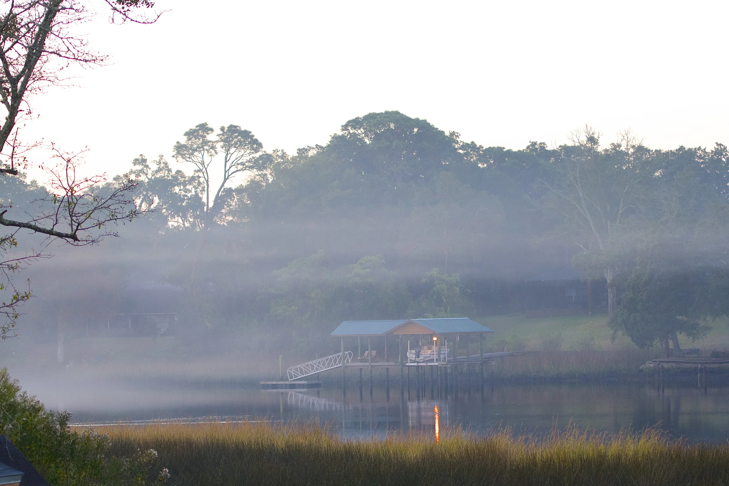 A smoke like layer of fog rises over the water this winter morning on the Broward.