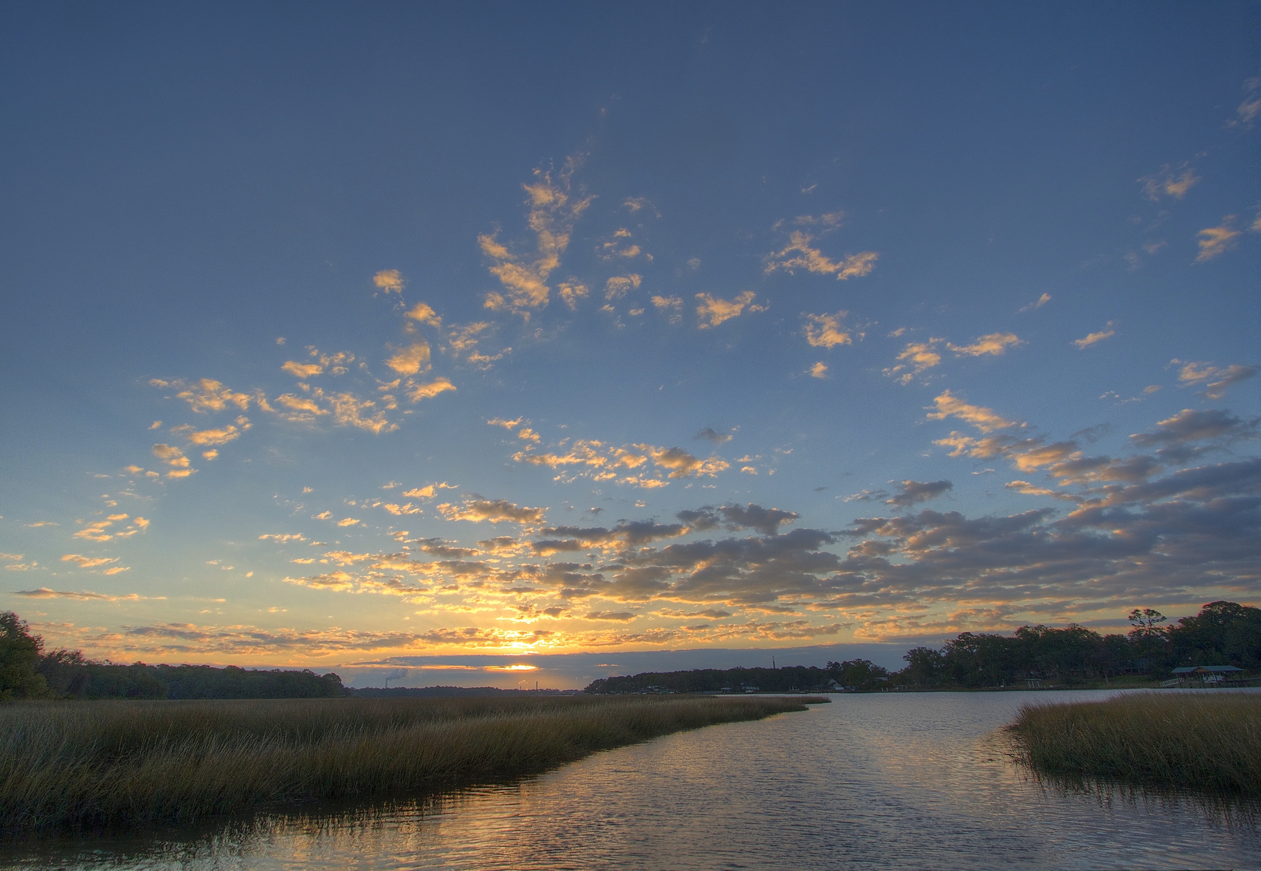 Dawns early light spreads over the Broward with Spring-like temperatures.