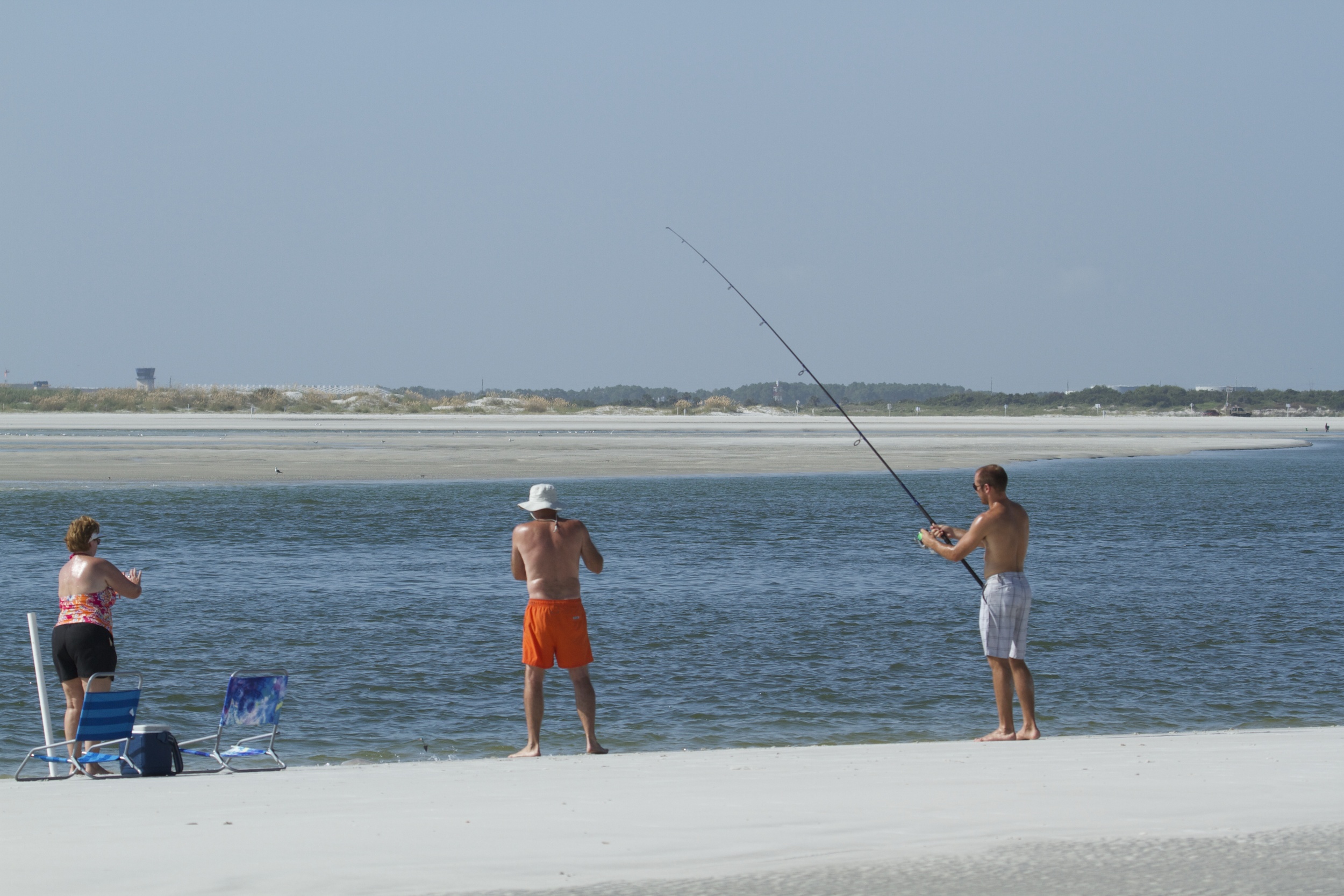 An Ohio family enjoys some surf fishing..they were the only other two legged creatures I saw on the beach.