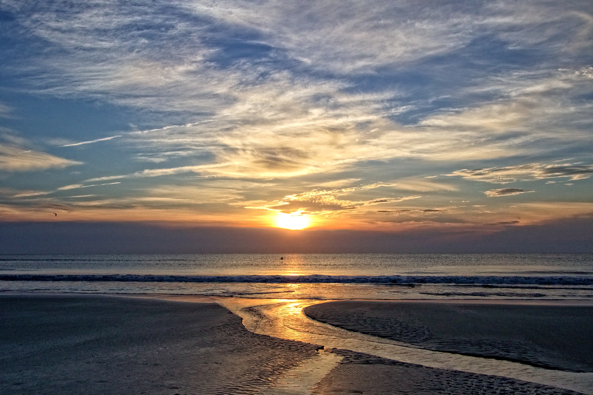 Pathways to the sea...a tidal tributary finds its way back to the sea on this Atlantic sunrise