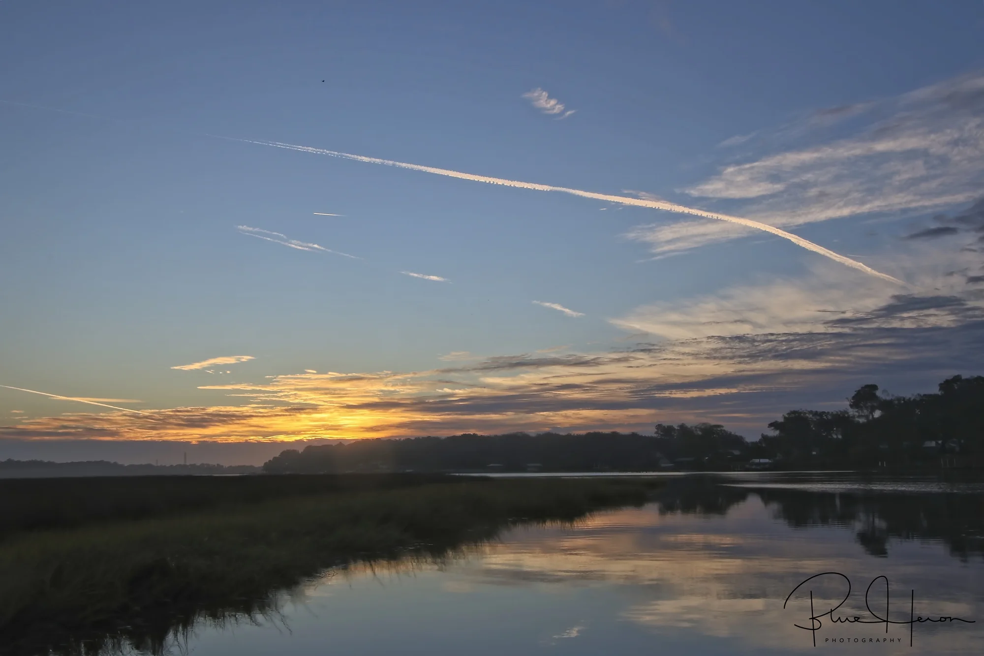 Contrails of hope stretch across the predawn sky…