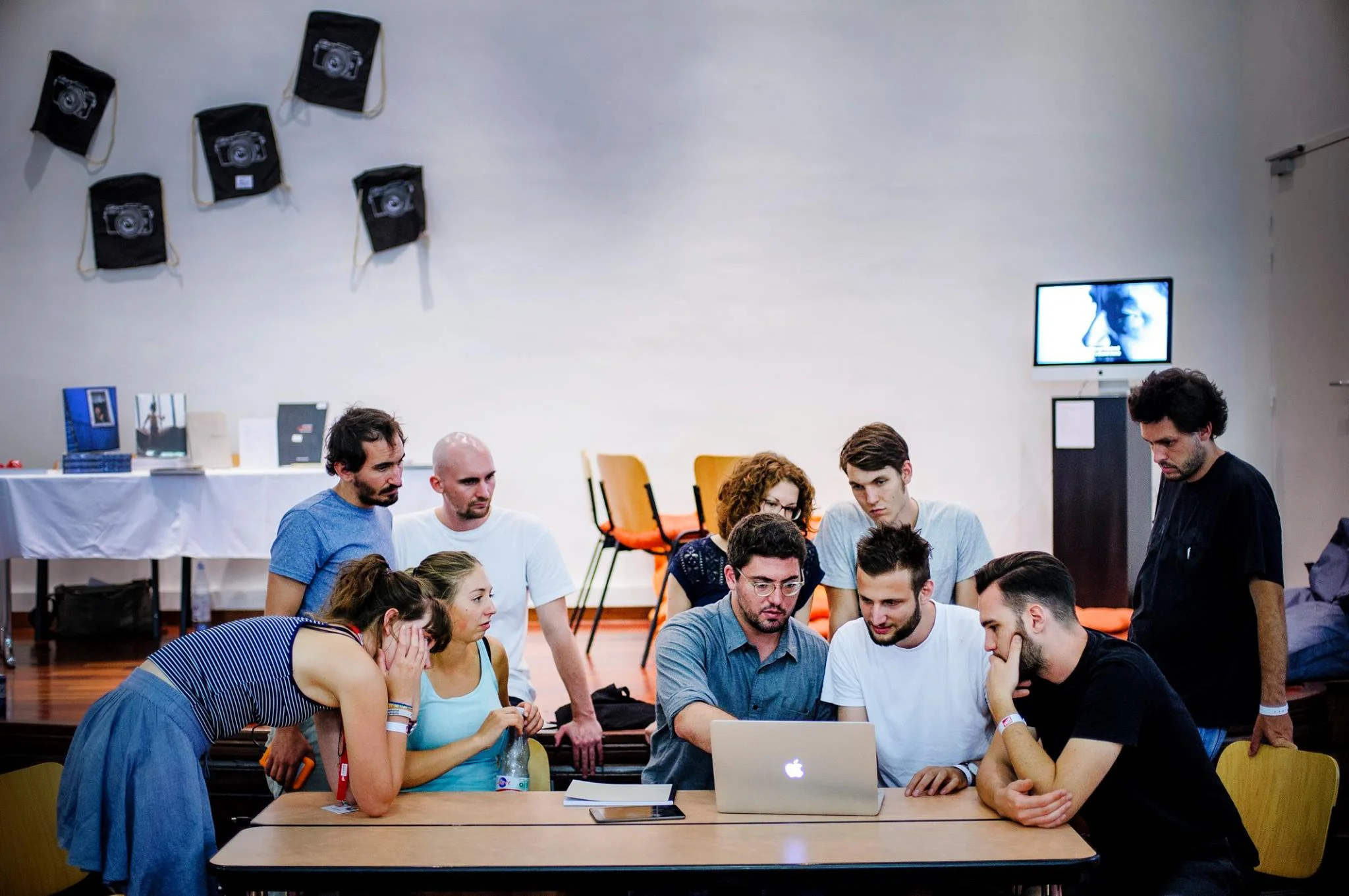 Portfolio Review during Visa pour l'Image in Perpignan, August 2016 for students attending the Hochschule Hannover, Fotojournalismus und Dokumentarfotografie program. Photo by Maximilian von Lachner