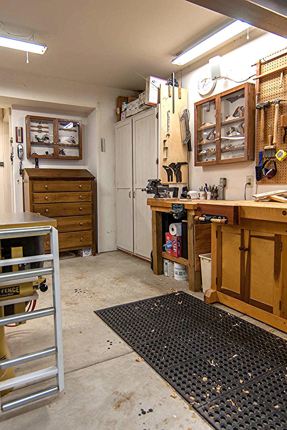 Shop looking NW; from left, table saw, fastner cabinet, hand plane cabinet, workbench 2, West hand plane cabinet, main workbench