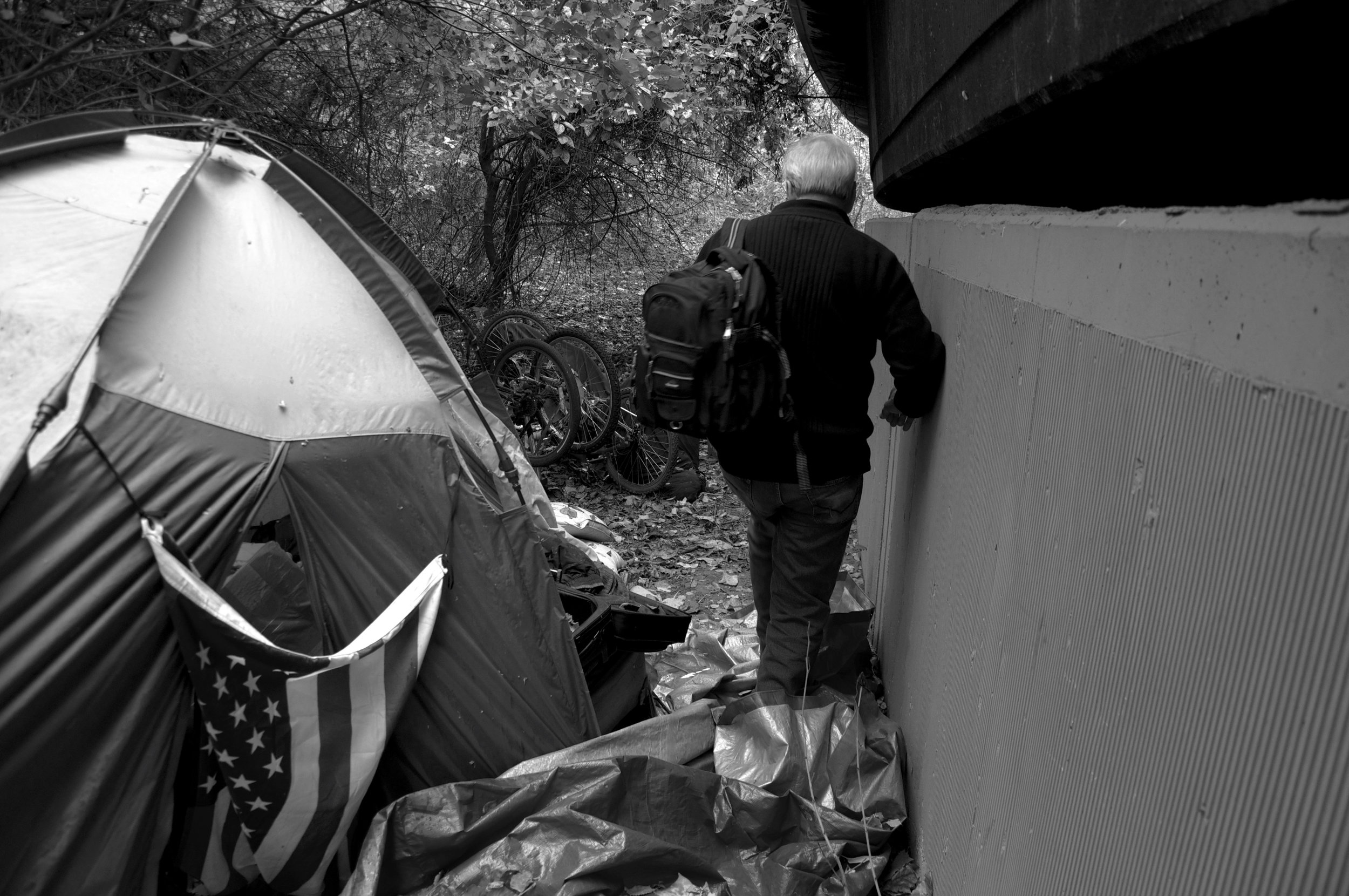  Cliff and Melanie, a homeless couple living underneath the freeway, are nowhere to be found, so Dr. Anthony Martinez continues his search for the couple. No one is in the tent and there is hardly a trace of activity. 