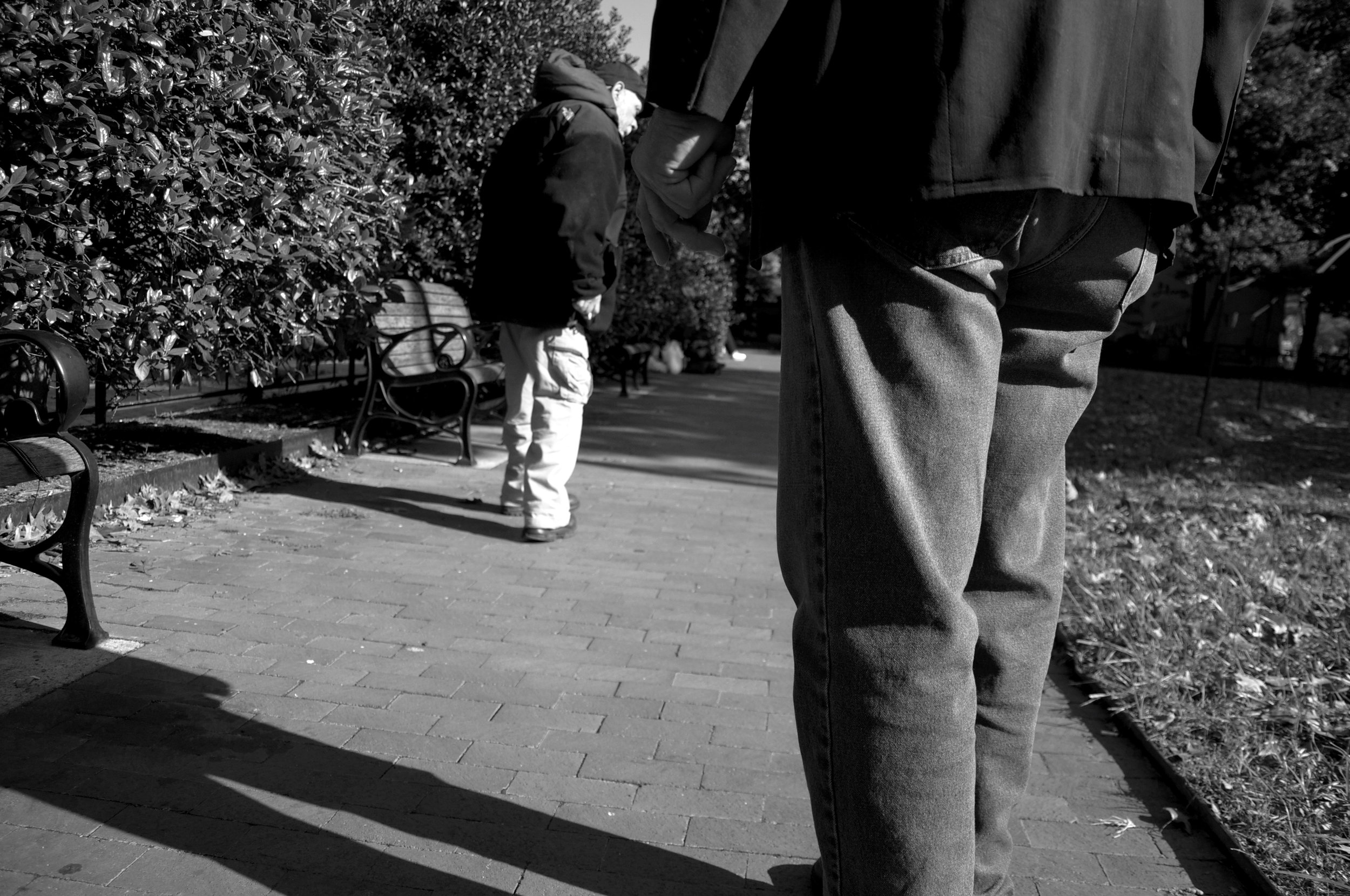  Glancing behind him, Charles Bowman walks away from Dr. Anthony Martinez, the retired doctor who supplied his new knee brace. The doctor tells Bowman he needs to remove the brace in a day or two so he won't experience a loss of circulation. Martinez