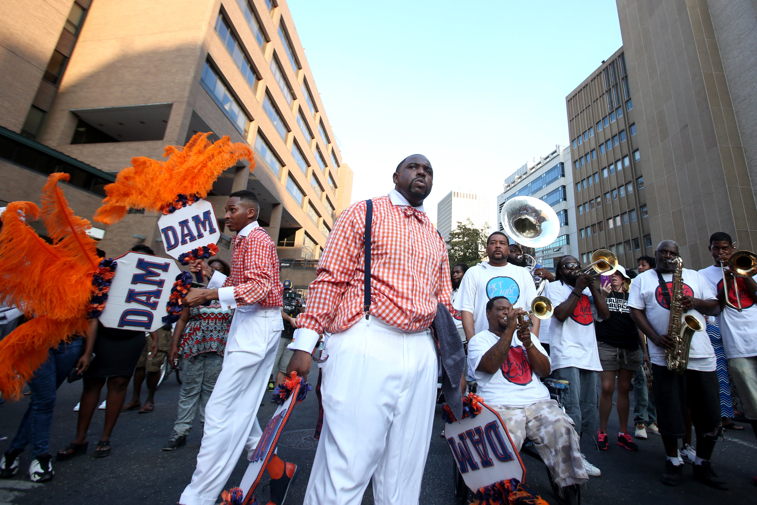  Members of the Dignified Achievable Men and Women Social Aid &amp; Pleasure Club march from Loyola Avenue to the Smoothie King Center in New Orleans, Louisiana on Saturday, August 29, 2015. More than 15 community and cultural groups and bands partic