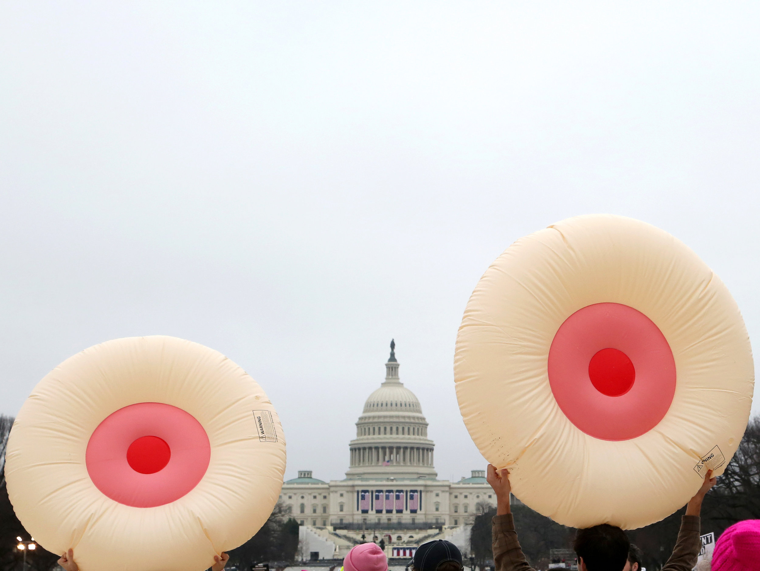  Two inflatable breasts face the United States Capitol Building Saturday, January 21, 2017, during the Women's March on Washington. 