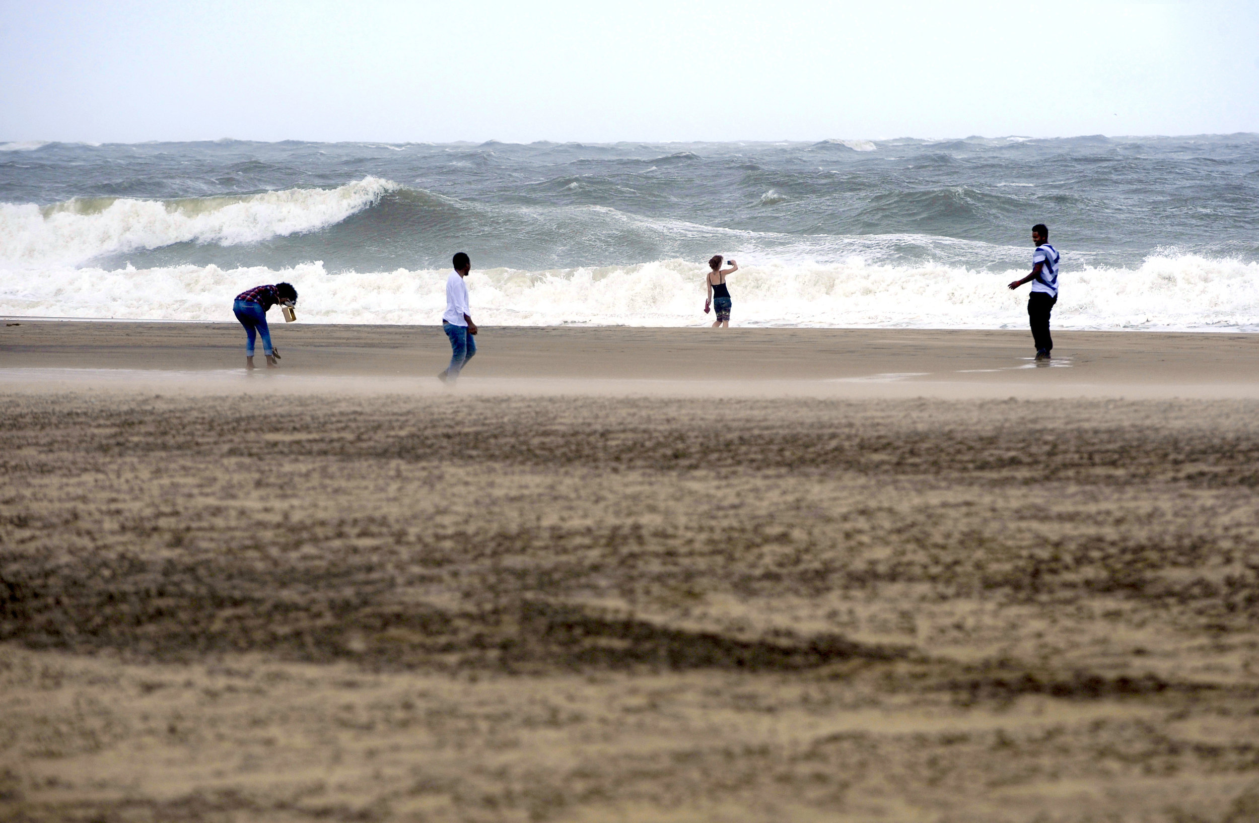  Vacationers take a trip to Ocean City, Maryland on Saturday, September 3, 2016,&nbsp;as Hermine downgraded to a post-tropical cyclone and brushed the resort town over Labor Day weekend. 