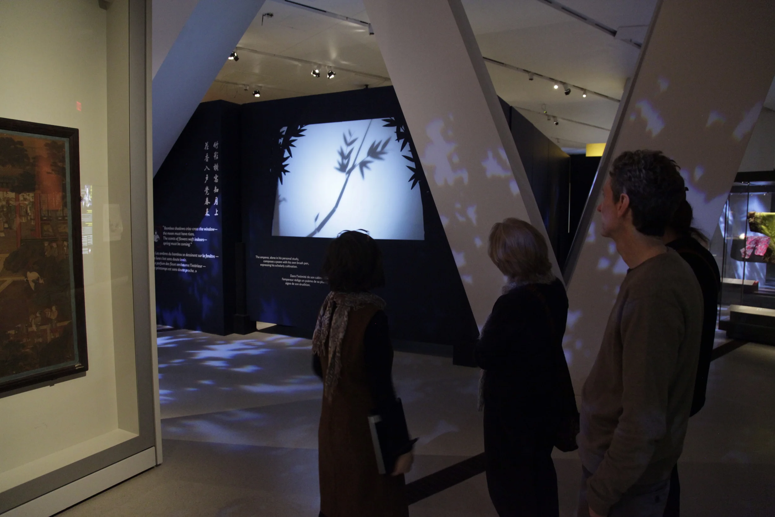   Emperor as Poet    The emperor, alone in his personal study, composes a poem with a brush pen, expressing his scholarly cultivation.&nbsp;  