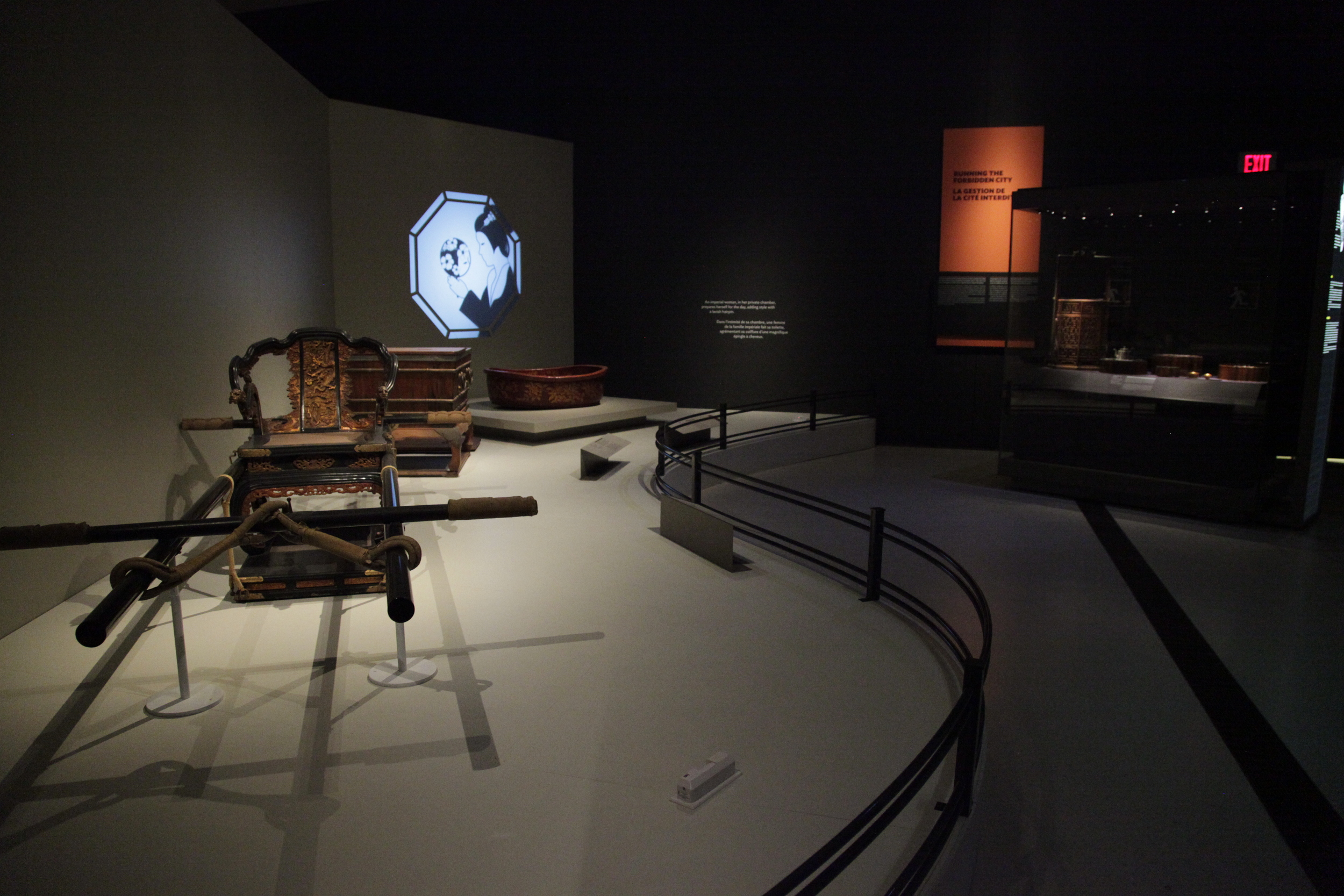   Imperial woman in chamber    An imperial woman, in her private chamber, prepares herself for the day, adding style with a lavish hairpin.   