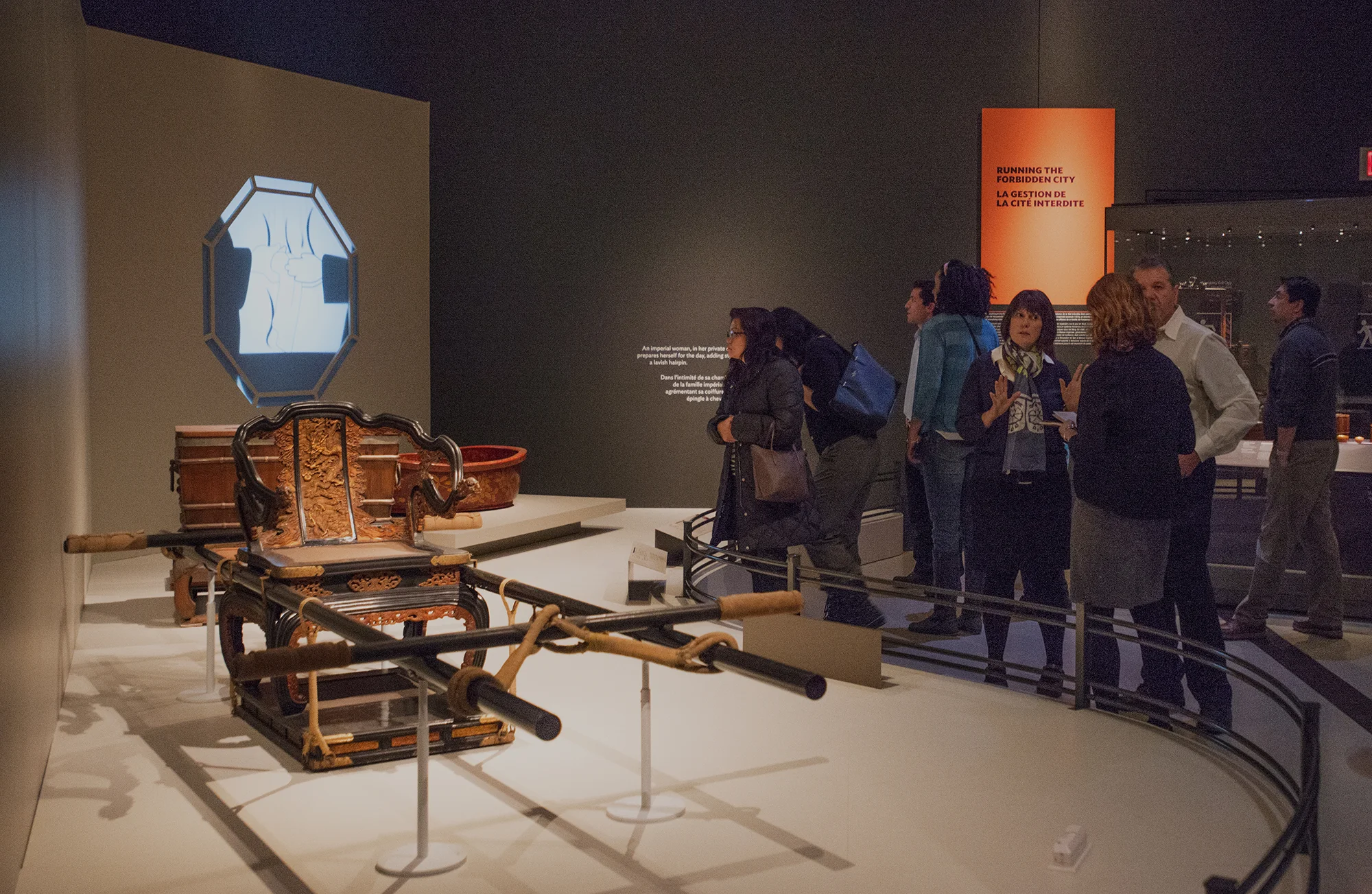   Imperial woman in chamber    An imperial woman, in her private chamber, prepares herself for the day, adding style with a lavish hairpin.  