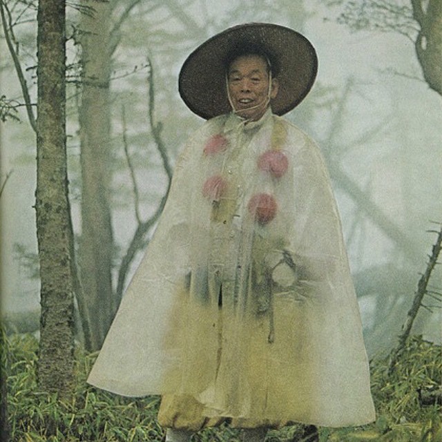 A_Japanese_hermit_emerges_from_his_solitude_in_a_protective_poncho__Honshu_Island__Japan__c._1970.jpg