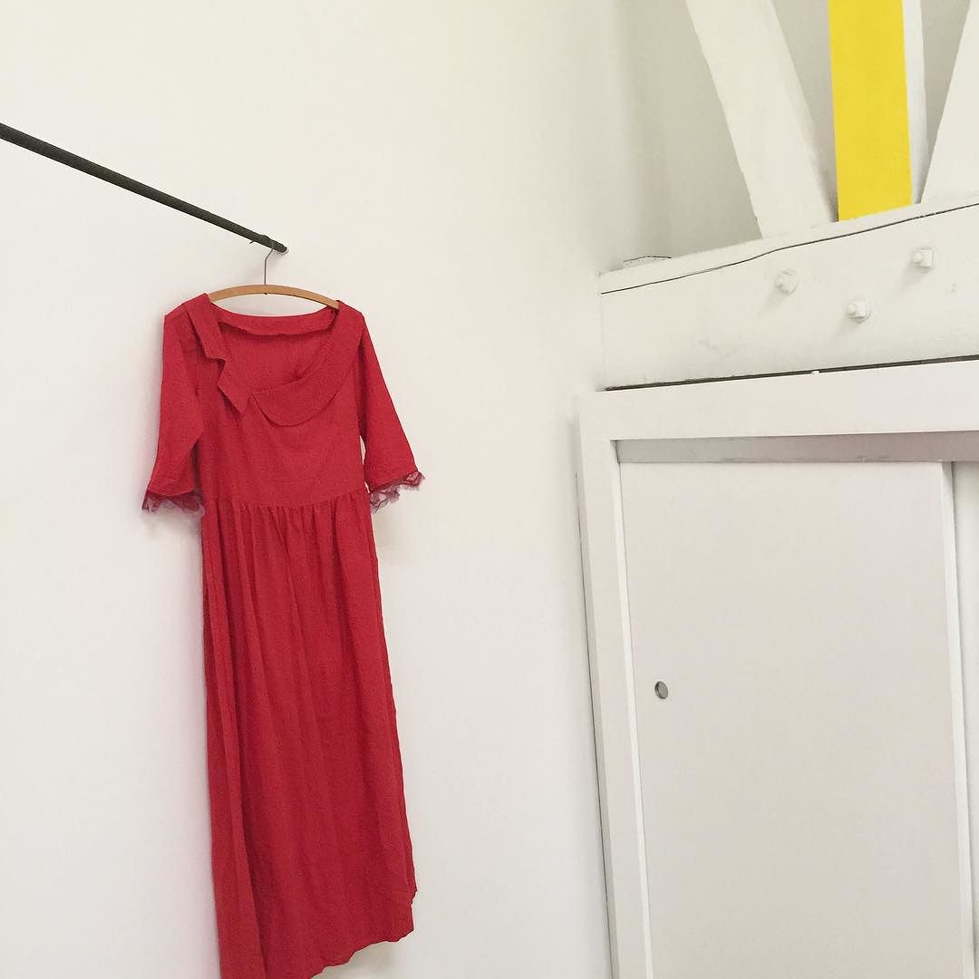 the red khadi cut out dress in the studio // hand dyed & hand spun in Gujarat