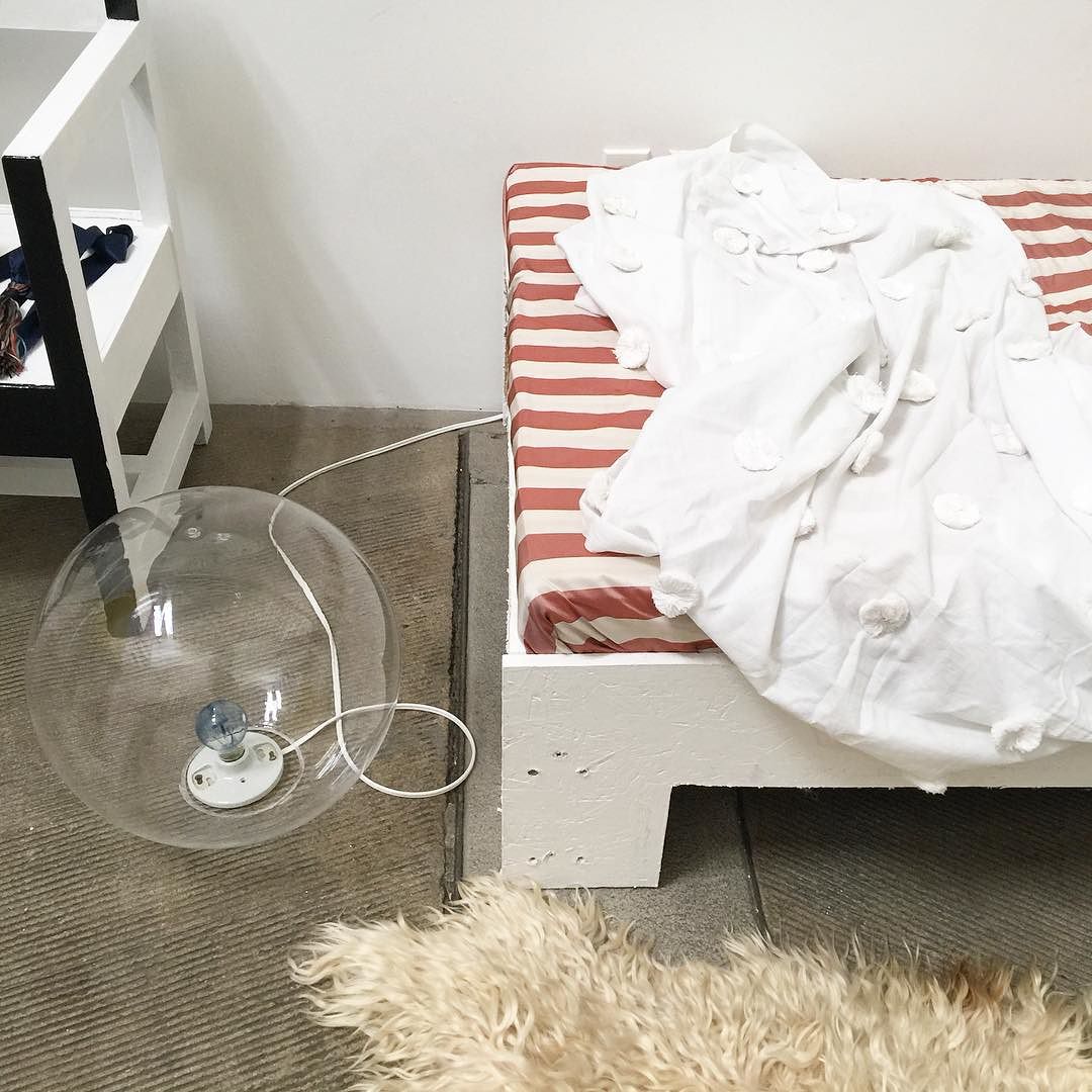 khadi cotton pom throw in the studio