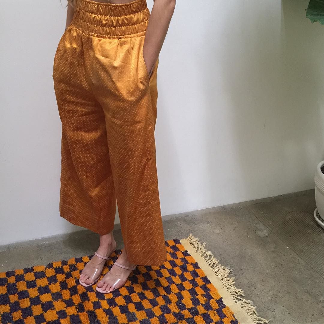 mashroo boxing pant, back in stock // silk/cotton mashroo hand-woven in Patan. Mashroo was originally created to conform to the tenets of Islam which disallowed pure silk to be worn. With mashroo, the silk warp floats on top while the cotton weft is what touches the skin and allowed the nobility to keep the opulence of silk while abiding by religious law.