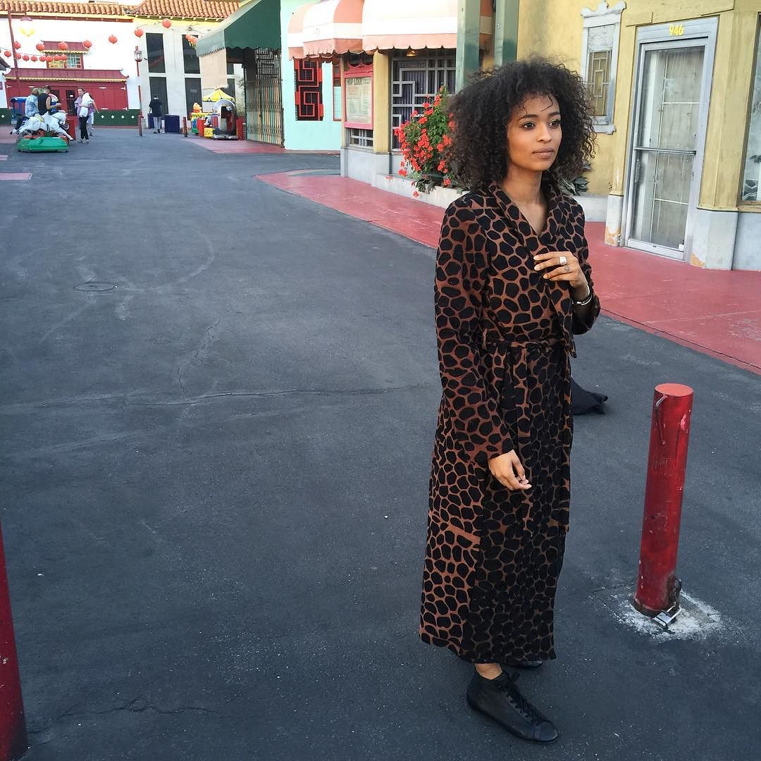 Kayla in Chinatown // hand-embroidered giraffe spot overcoat, Ahmedabad