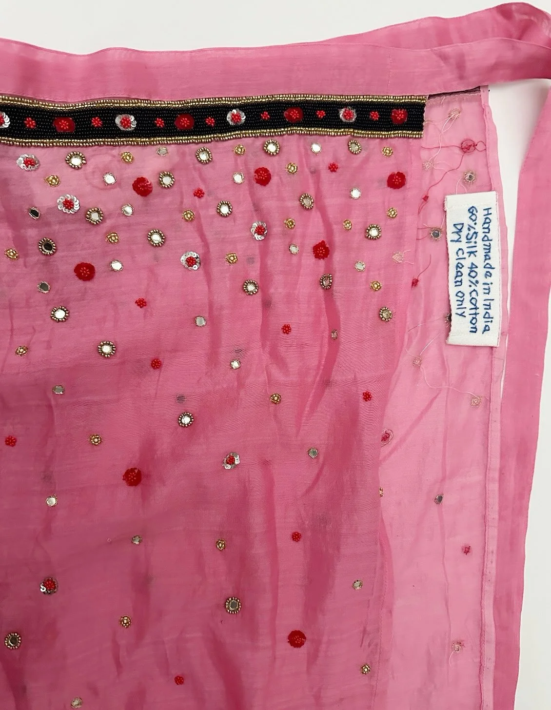 hand-woven silk chanderi with mirror/beadwork and kasab embroidery // mirror work is traced back to the 13th century in Persia and is noted to have been brought to India through travelers and merchants during the Mughal era. The mirrors are affixed o