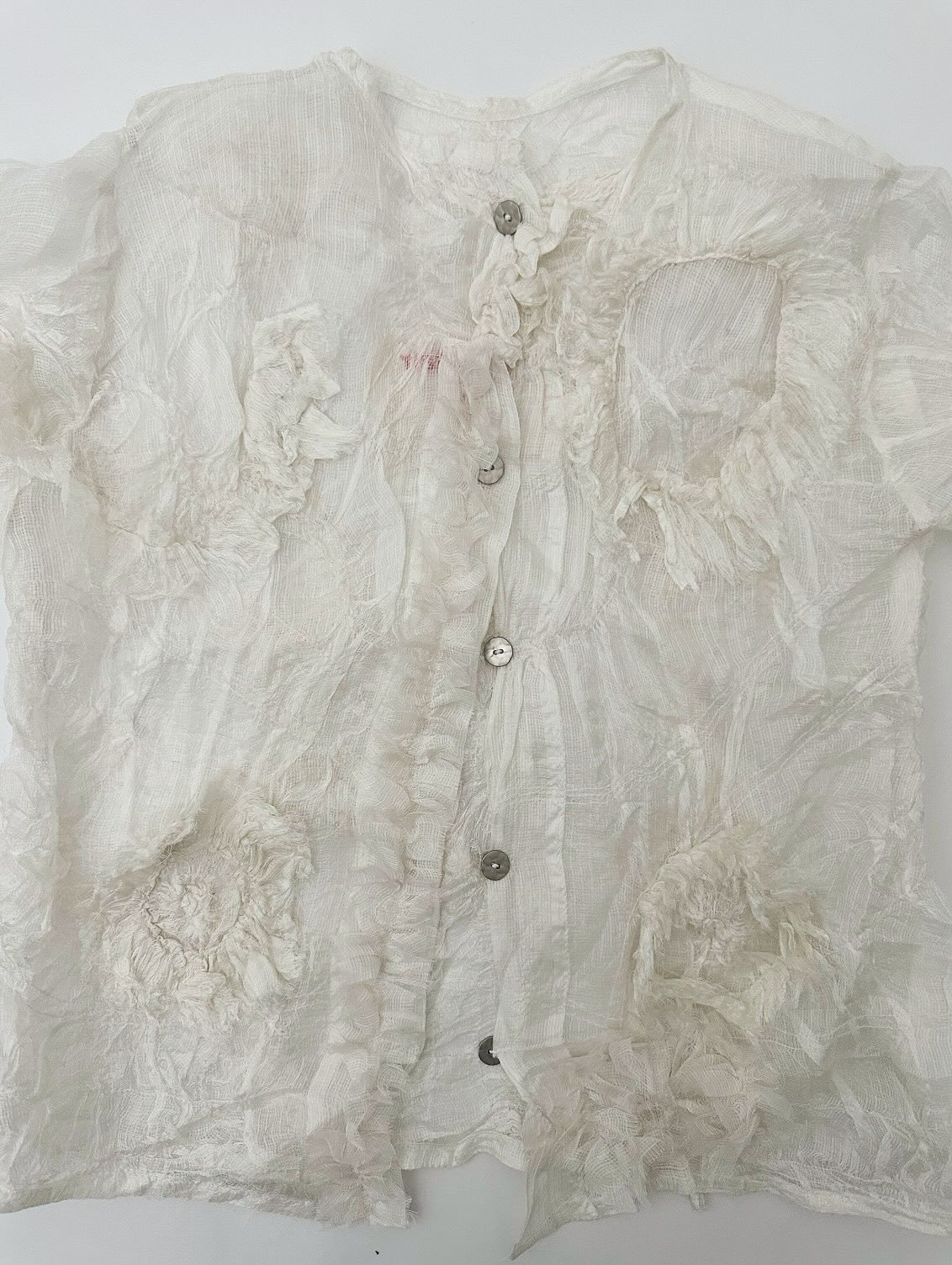 diaphanous hand-woven silk kota tissue textile with appliqu&eacute;s of gathering // silk kota is said to have originated from Mysore in the 17th century