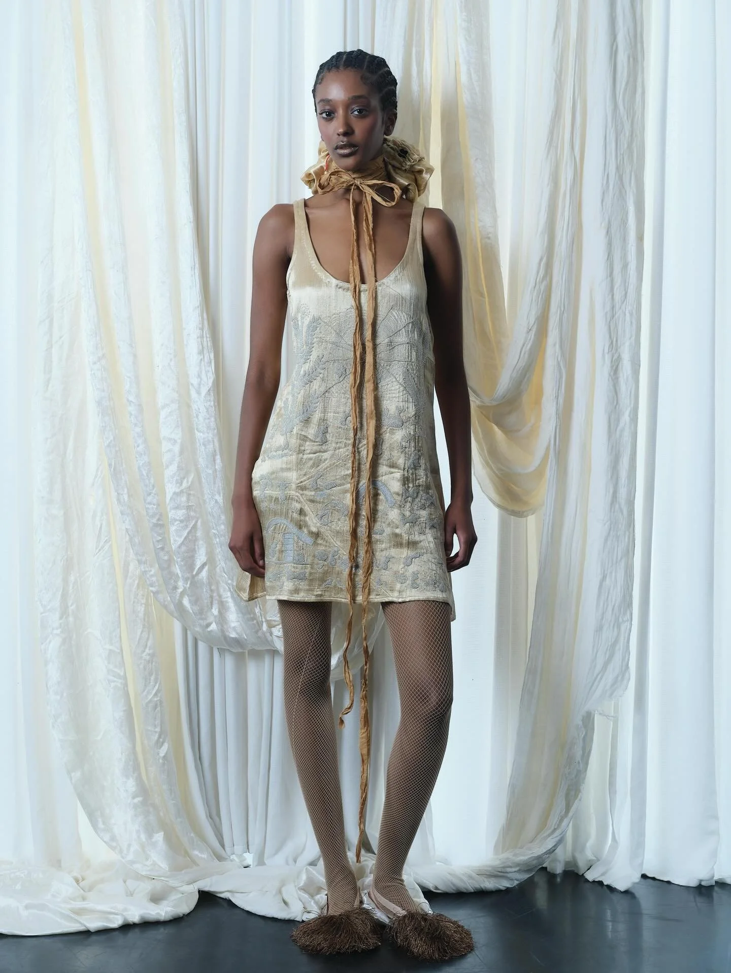 Helina in hand-woven silk mashroo with glass beadwork spider web warli sheath dress 

Collection 17