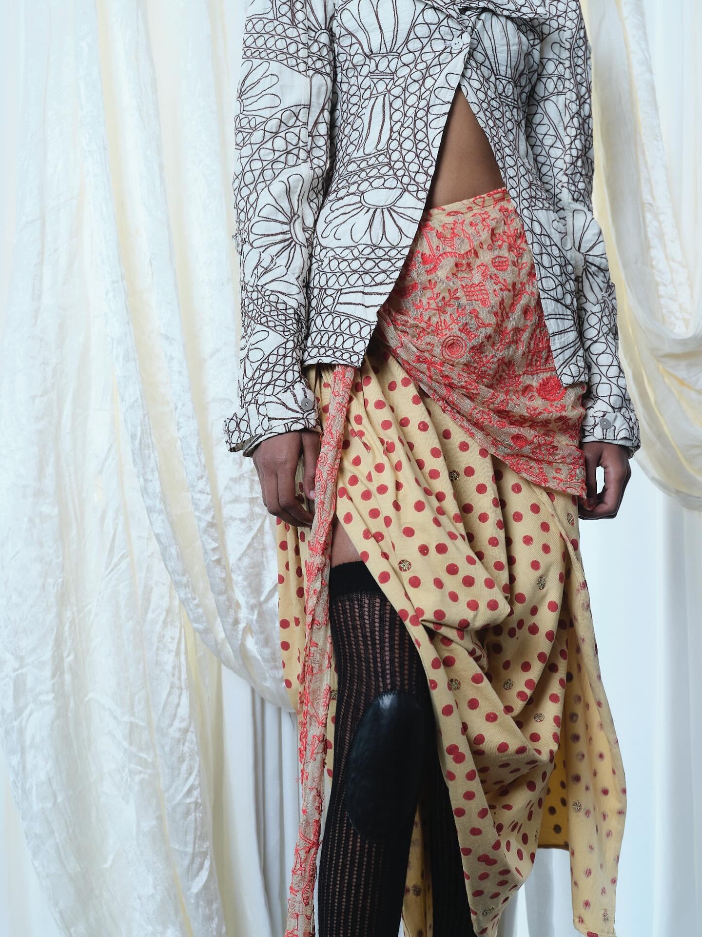 hand-embroidered Rabari deconstructed jacket and drape skirt in block-printed organic cotton knit with Warli hand-embroidered scapes on silk kota / Collection 17