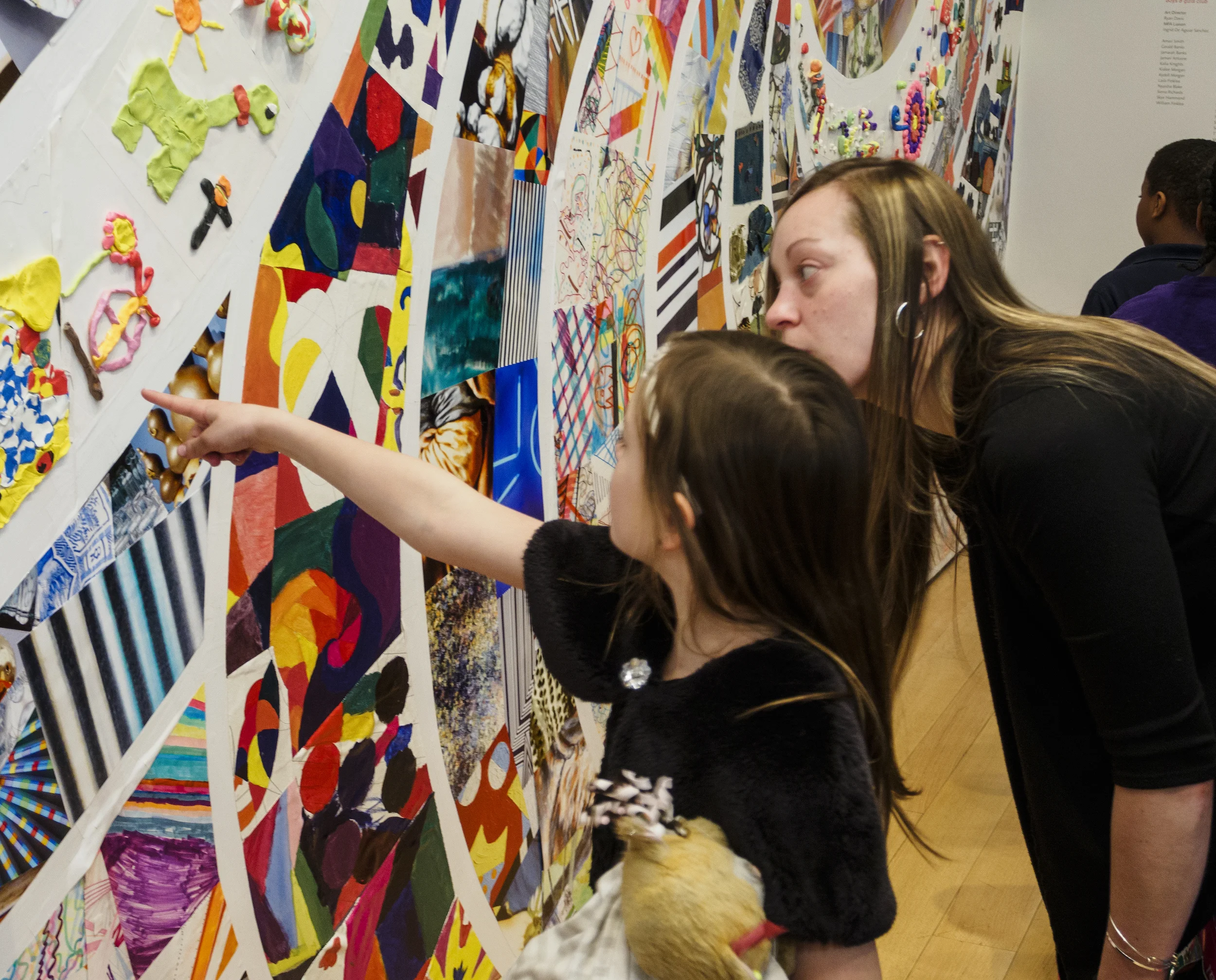 Student Artist and her family at the opening of Elemental