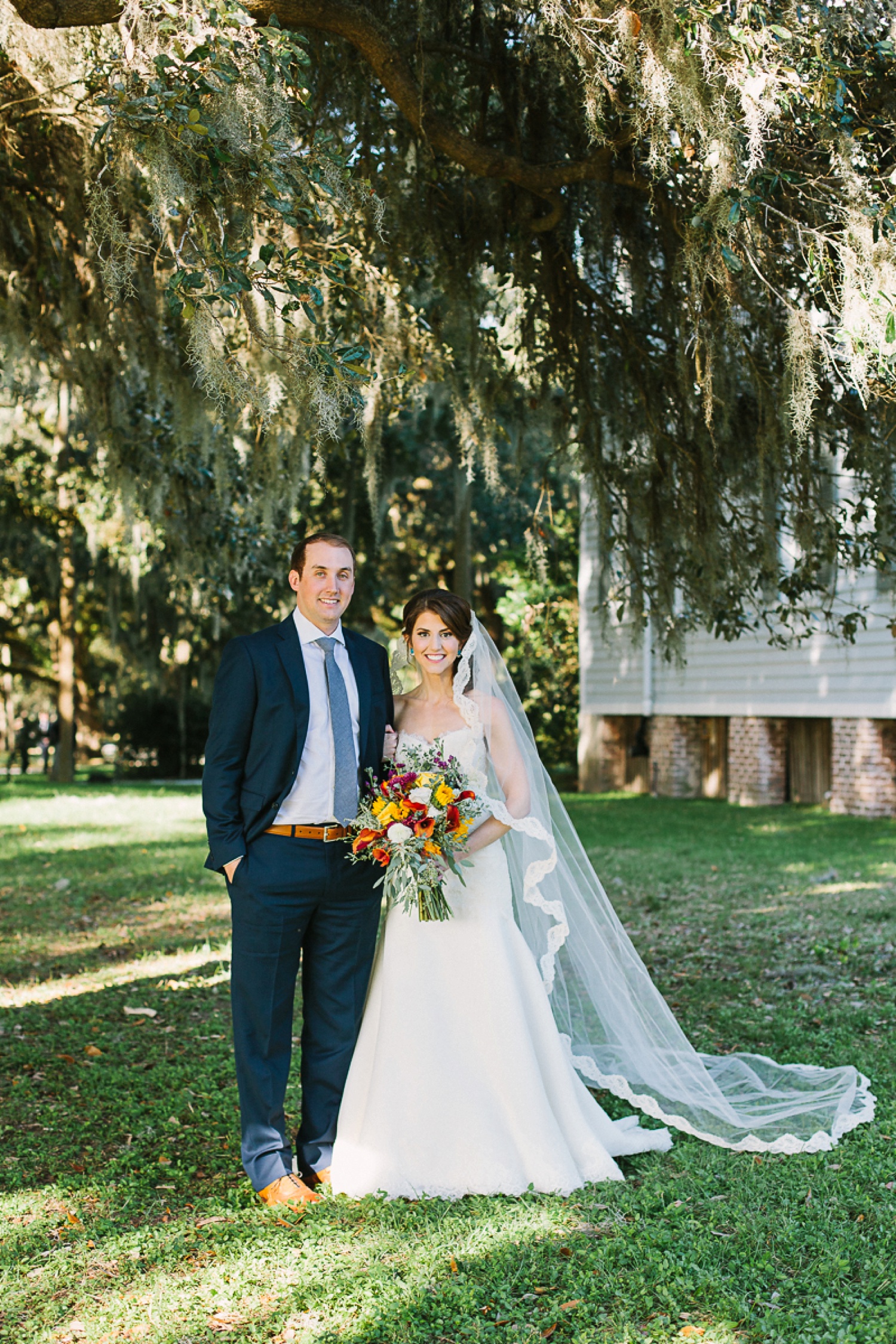 Lindsey_A_Miller_photography_charleston_mcleod_plantation_wedding_row_of_oaks_southern_classic_fall_spanish_moss_historic_home_040.jpg