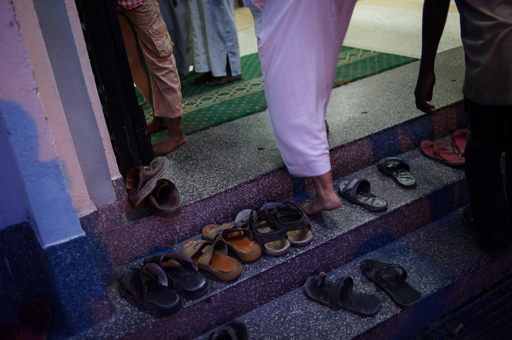 Muslims enter the Mussa mosque in Mombasa, where the late Aboud Rogo, a Muslim cleric, delivered a weekly lecture, and is where his body was brought following his assassination on August 27, 2012.
