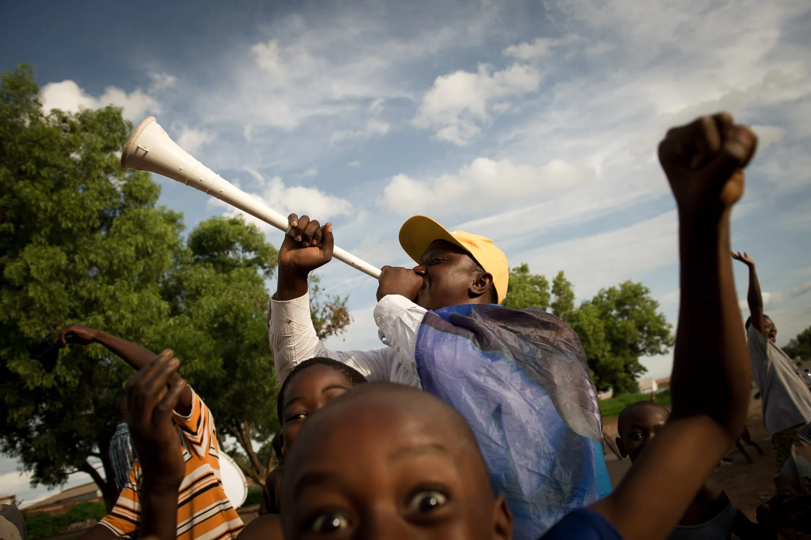 Supporters of incumbent president Joseph Kabila celebrate the announcement of his re-election in Lubumbashi, D. R. Congo in 2011