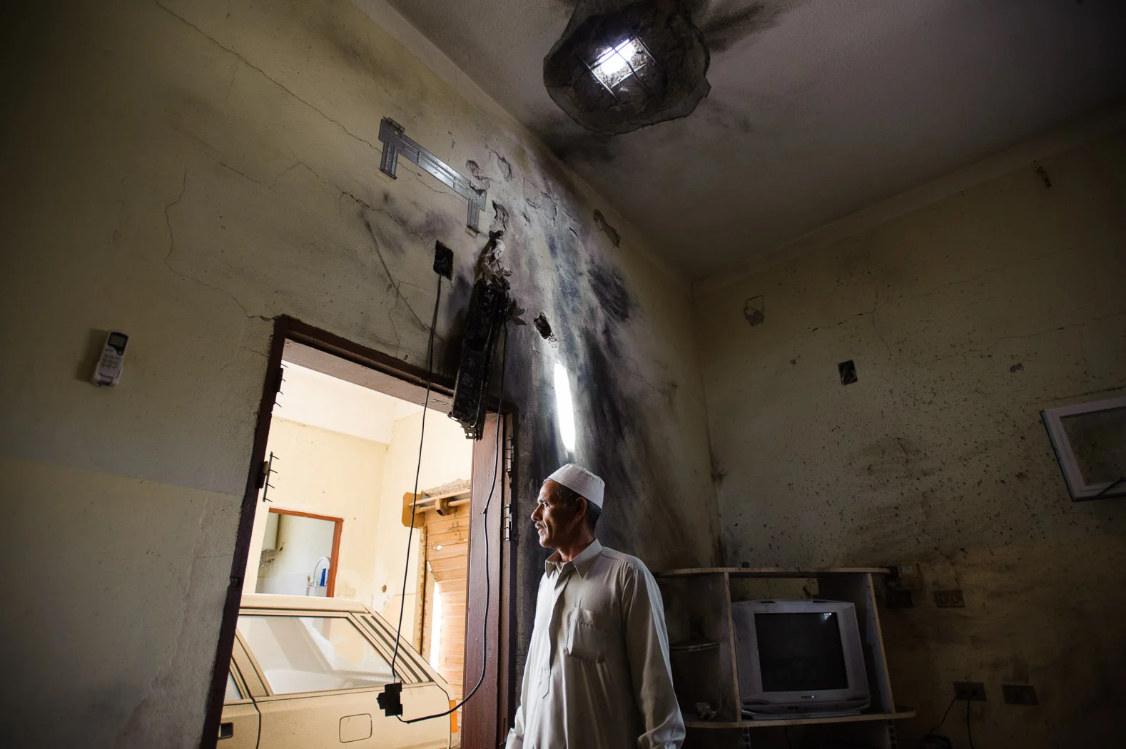 In Misrata, a town that became besieged by loyalist troops after anti-regime fighting broke out, shells rained down daily, destroying civilian homes.