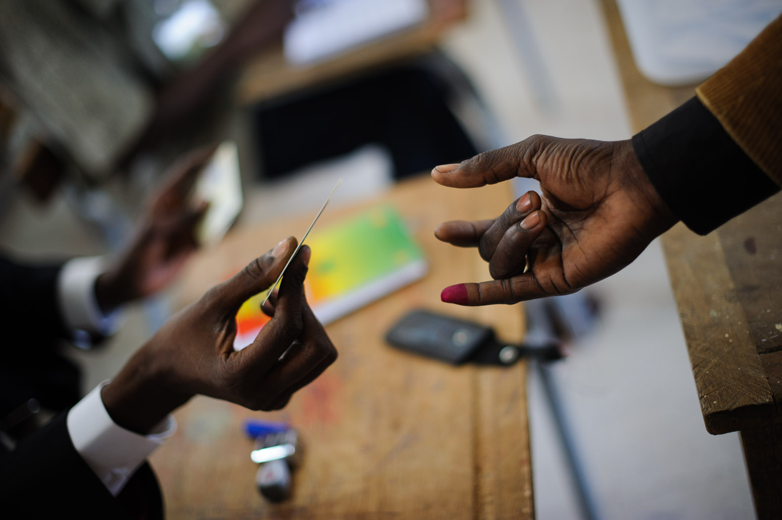 Those voting had their fingers stained with dye to prevent multiple votes.
